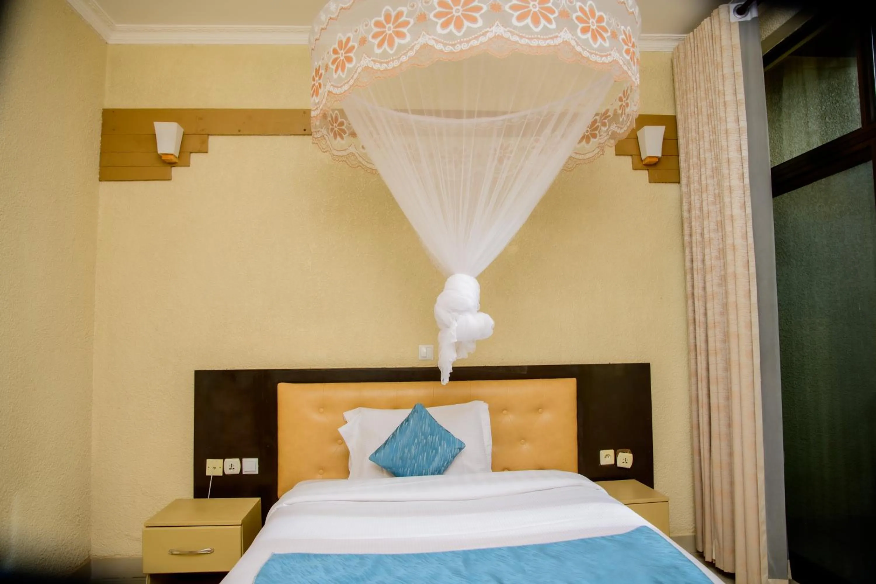 Bed in Quality Inn Hotel Kigali