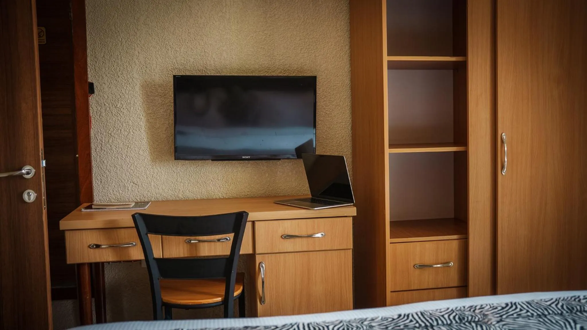 TV and multimedia in Quality Inn Hotel Kigali