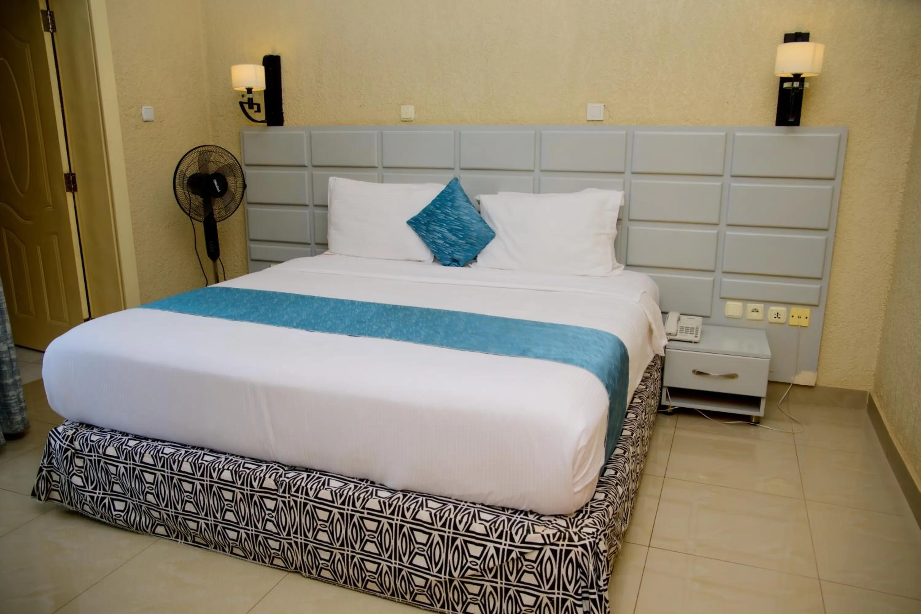 Bed in Quality Inn Hotel Kigali
