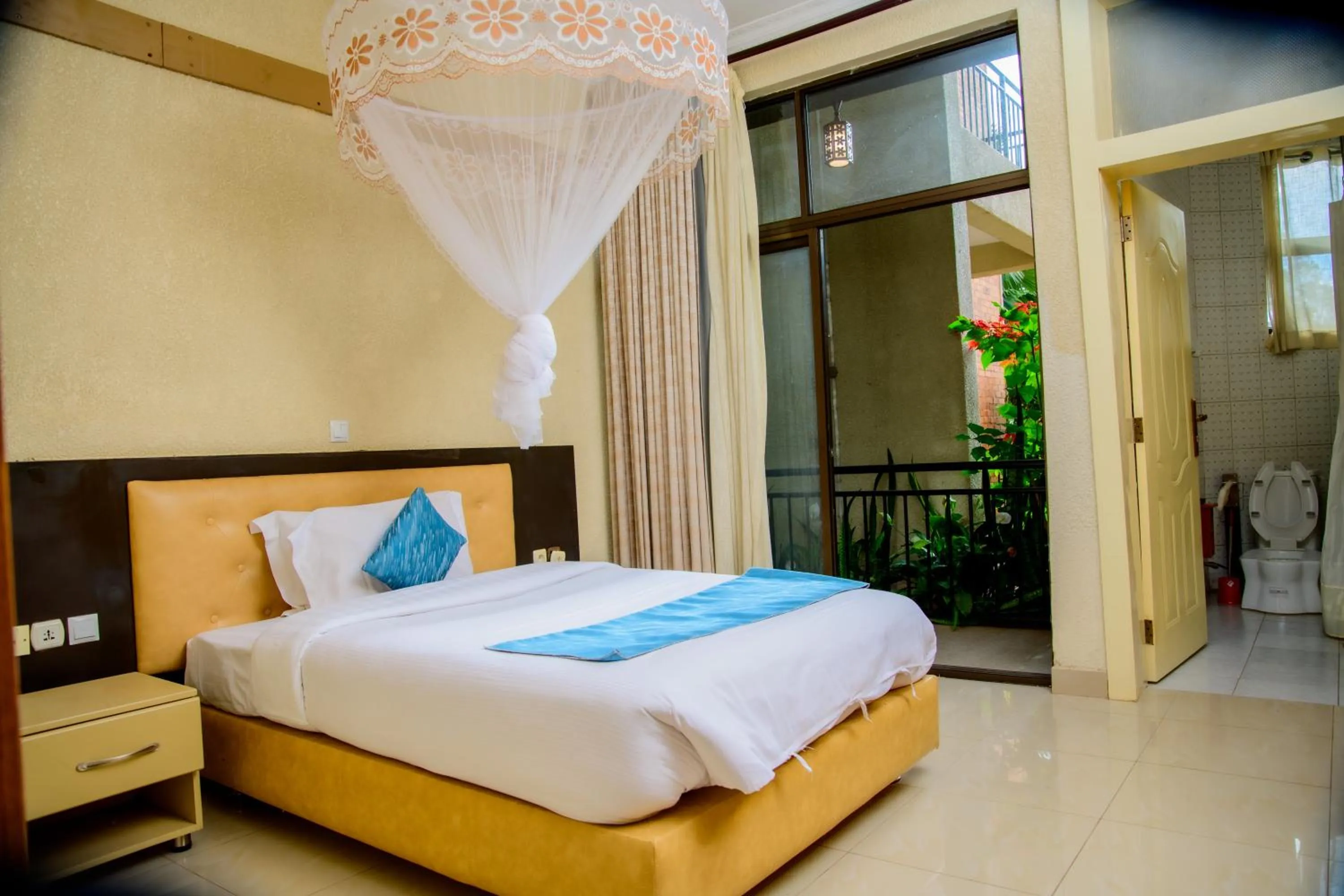 Bed in Quality Inn Hotel Kigali