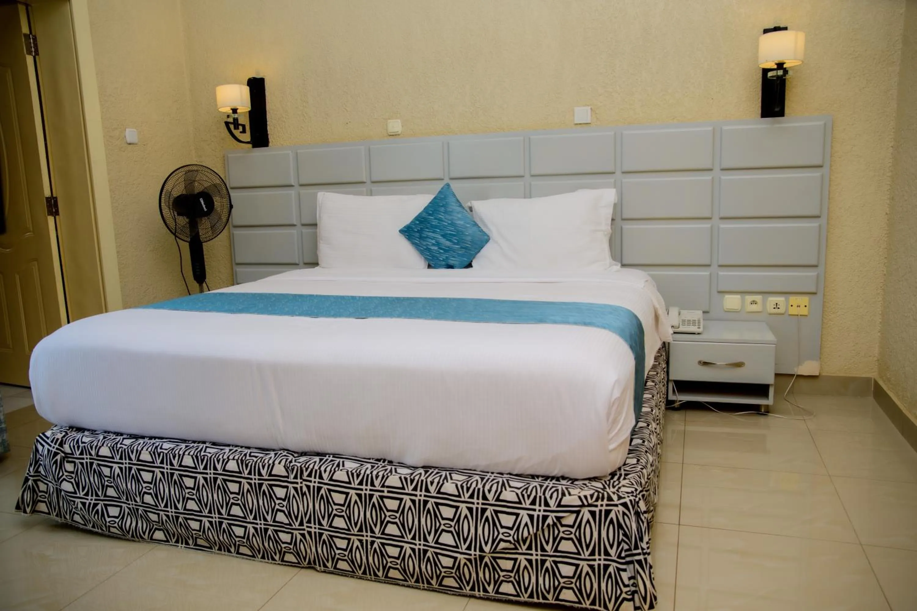 Bed in Quality Inn Hotel Kigali