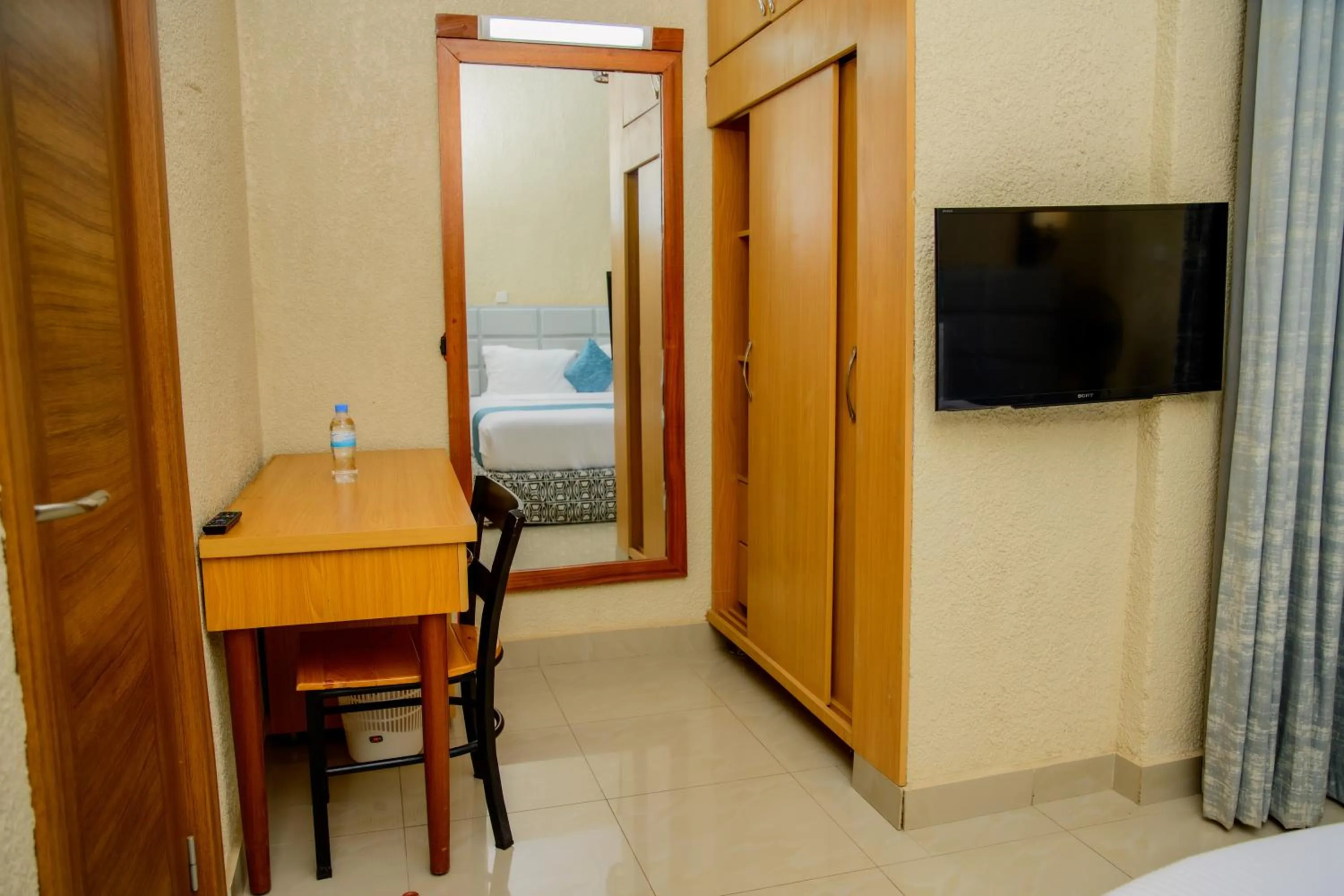 Bed in Quality Inn Hotel Kigali