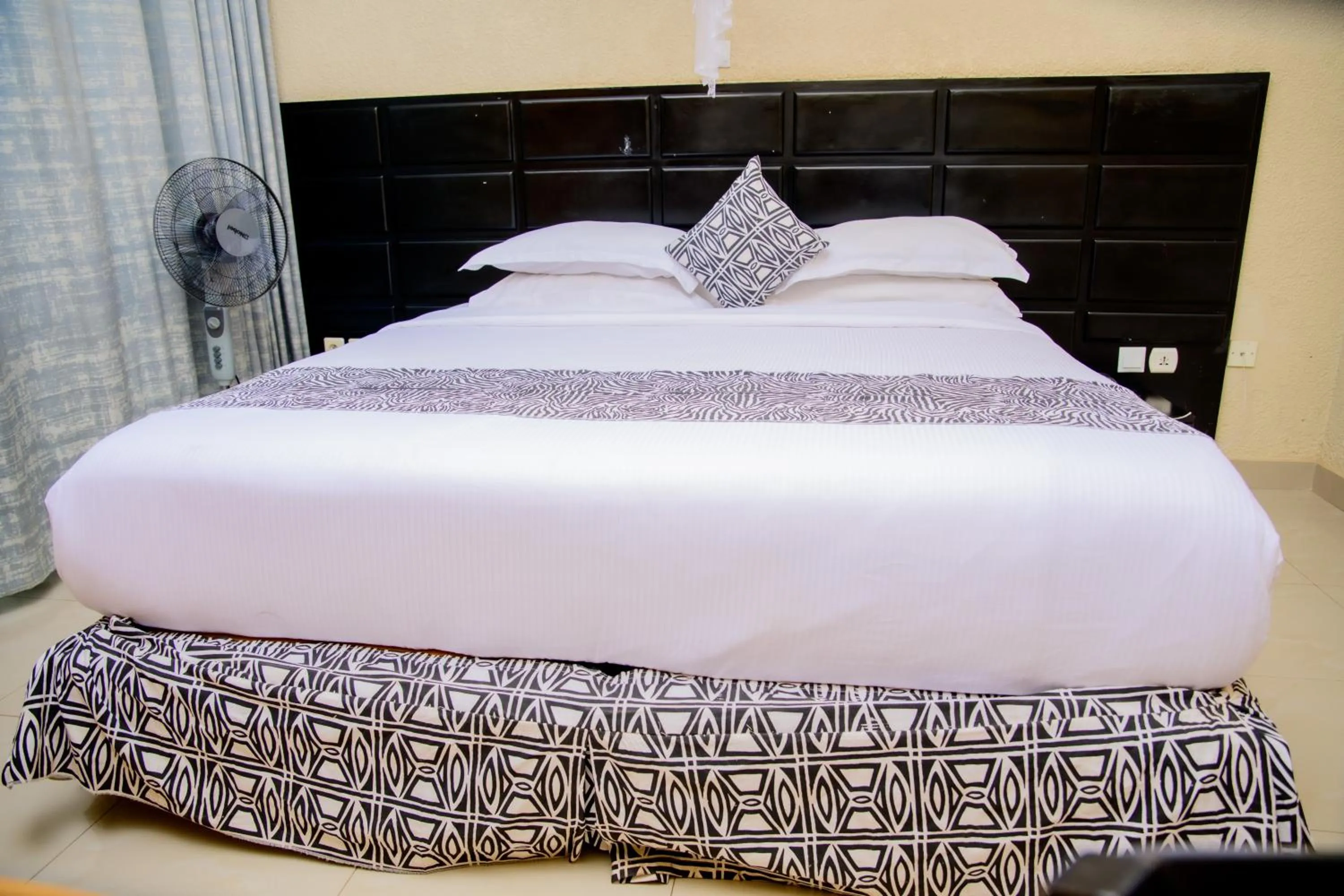 Bed in Quality Inn Hotel Kigali