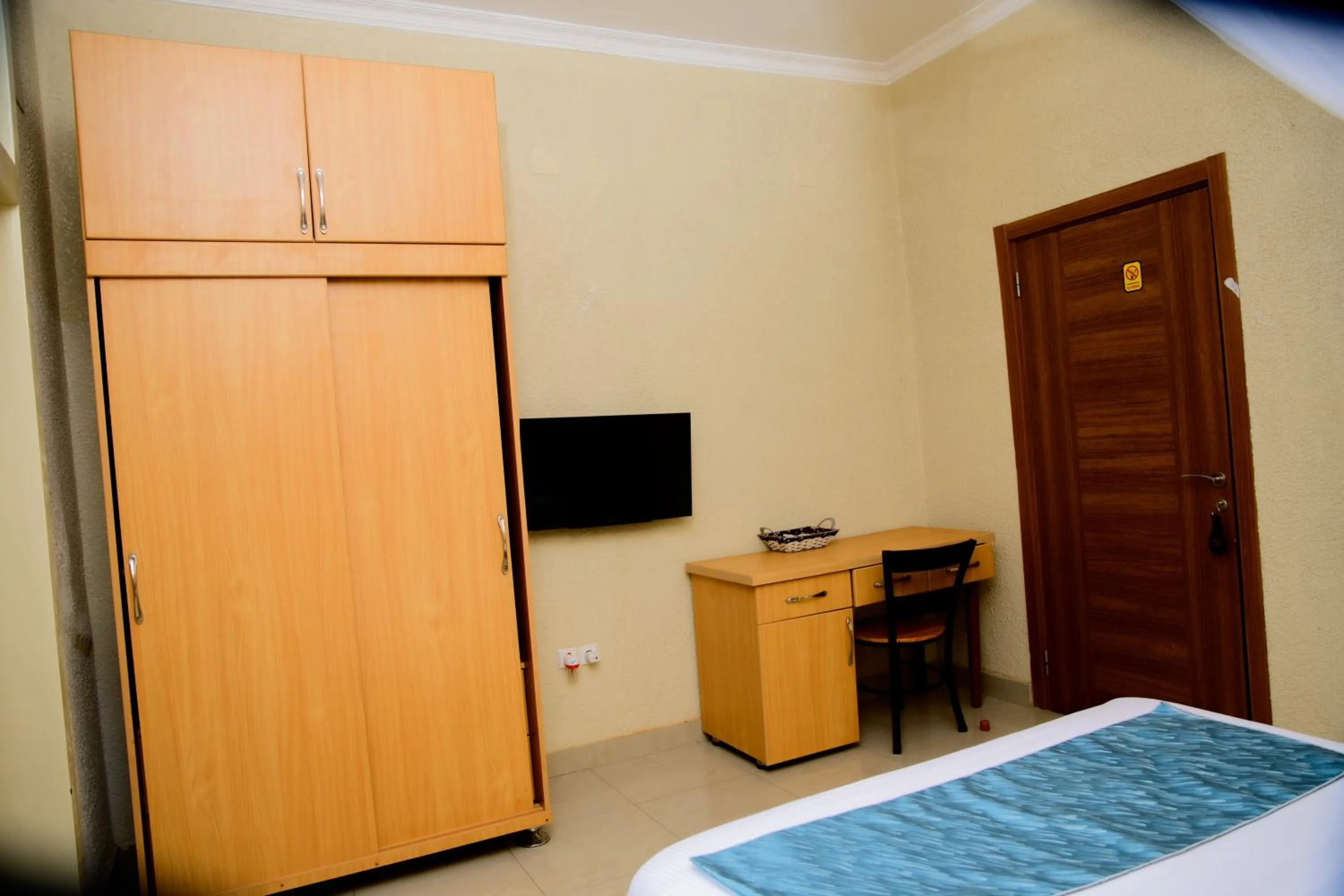 Bed in Quality Inn Hotel Kigali
