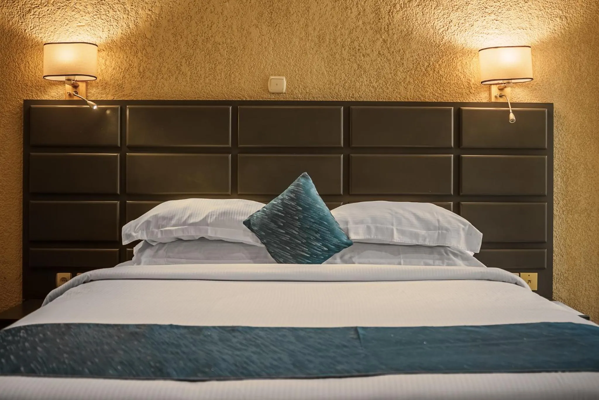 Bed in Quality Inn Hotel Kigali