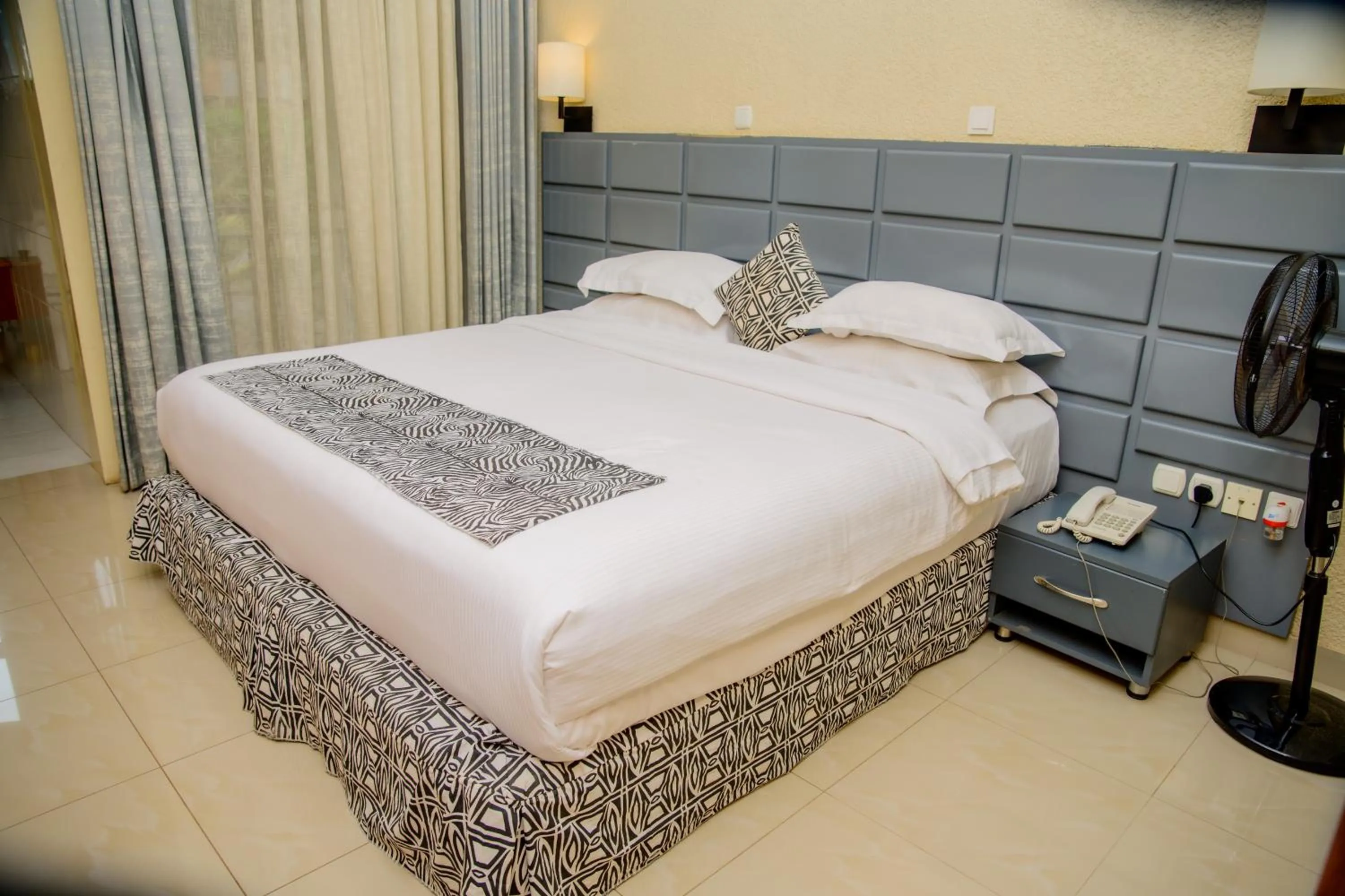 Bed in Quality Inn Hotel Kigali