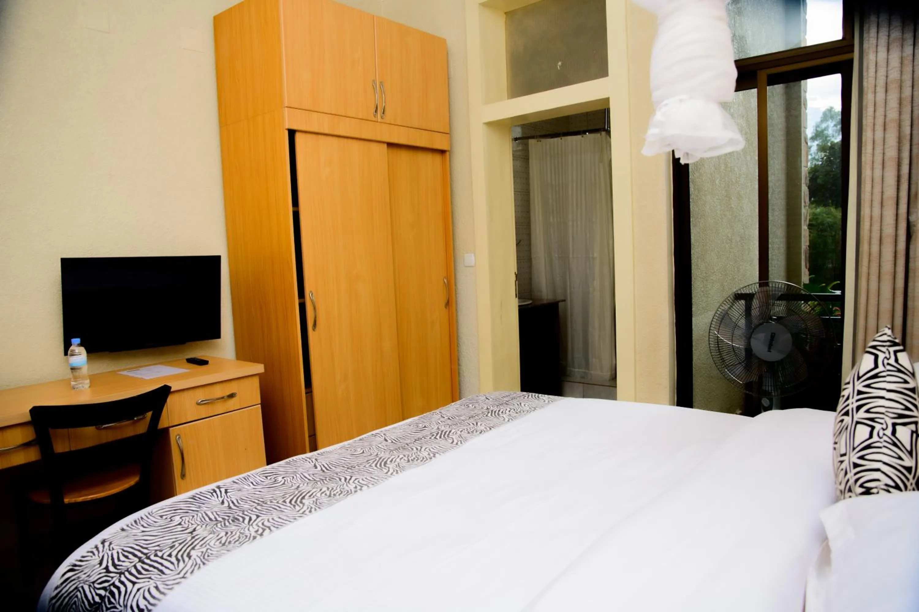 Bed in Quality Inn Hotel Kigali