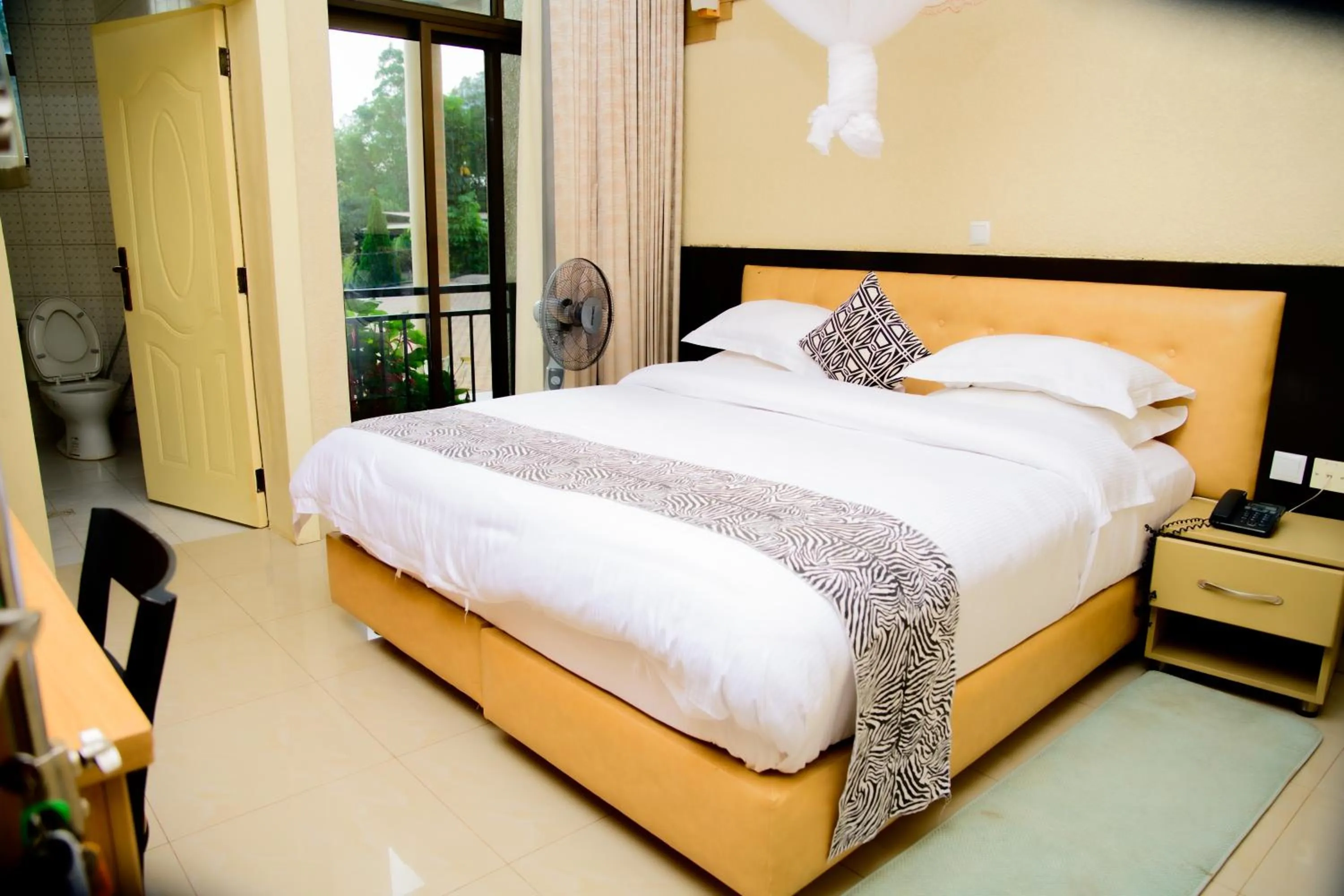 Bed in Quality Inn Hotel Kigali