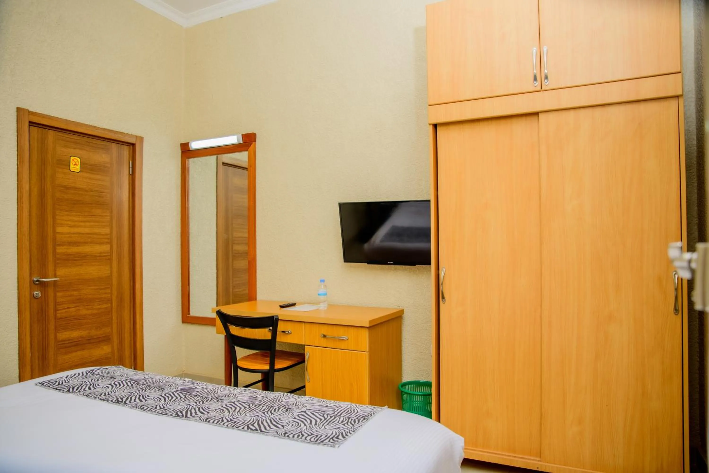 Bed in Quality Inn Hotel Kigali