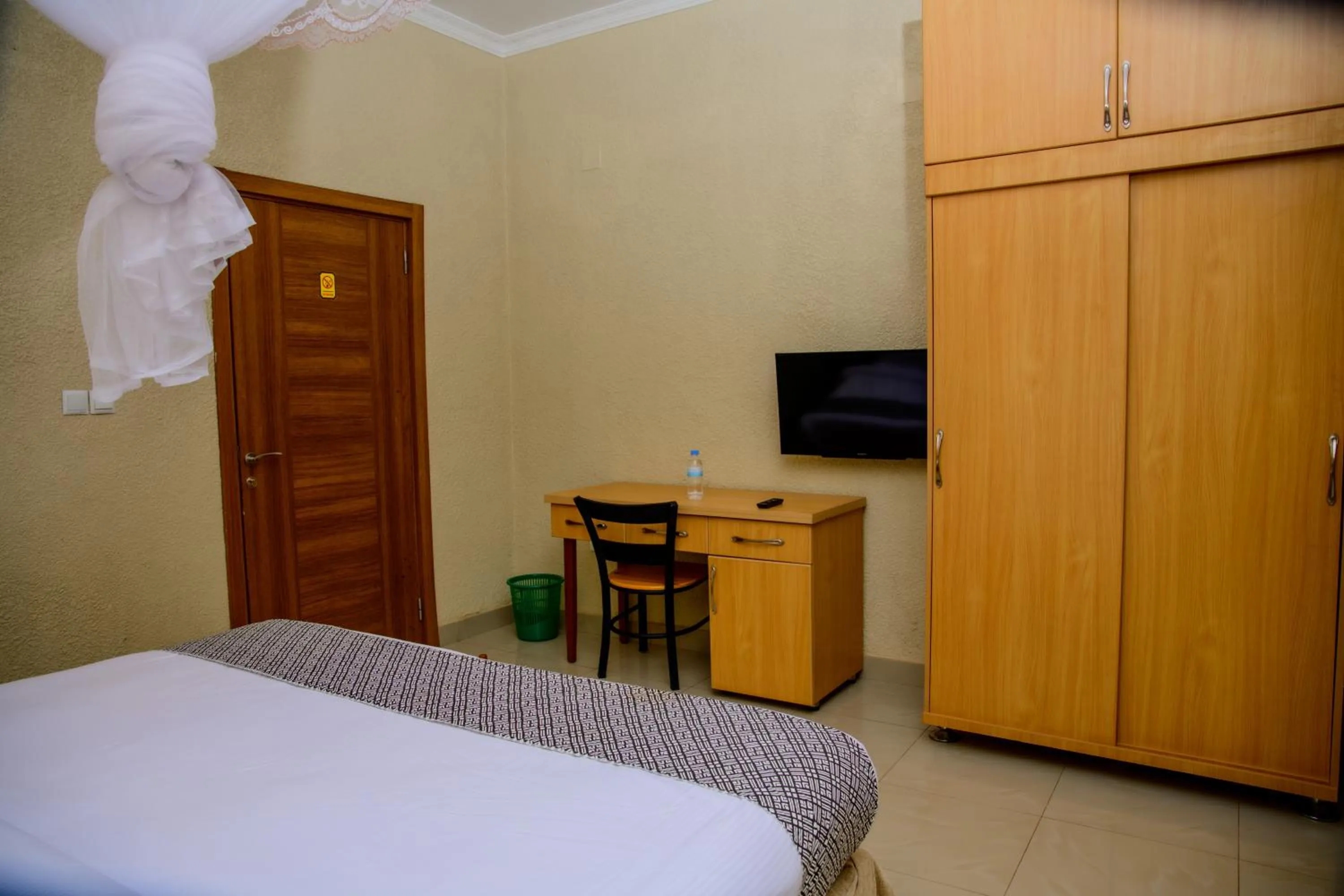 Bed in Quality Inn Hotel Kigali