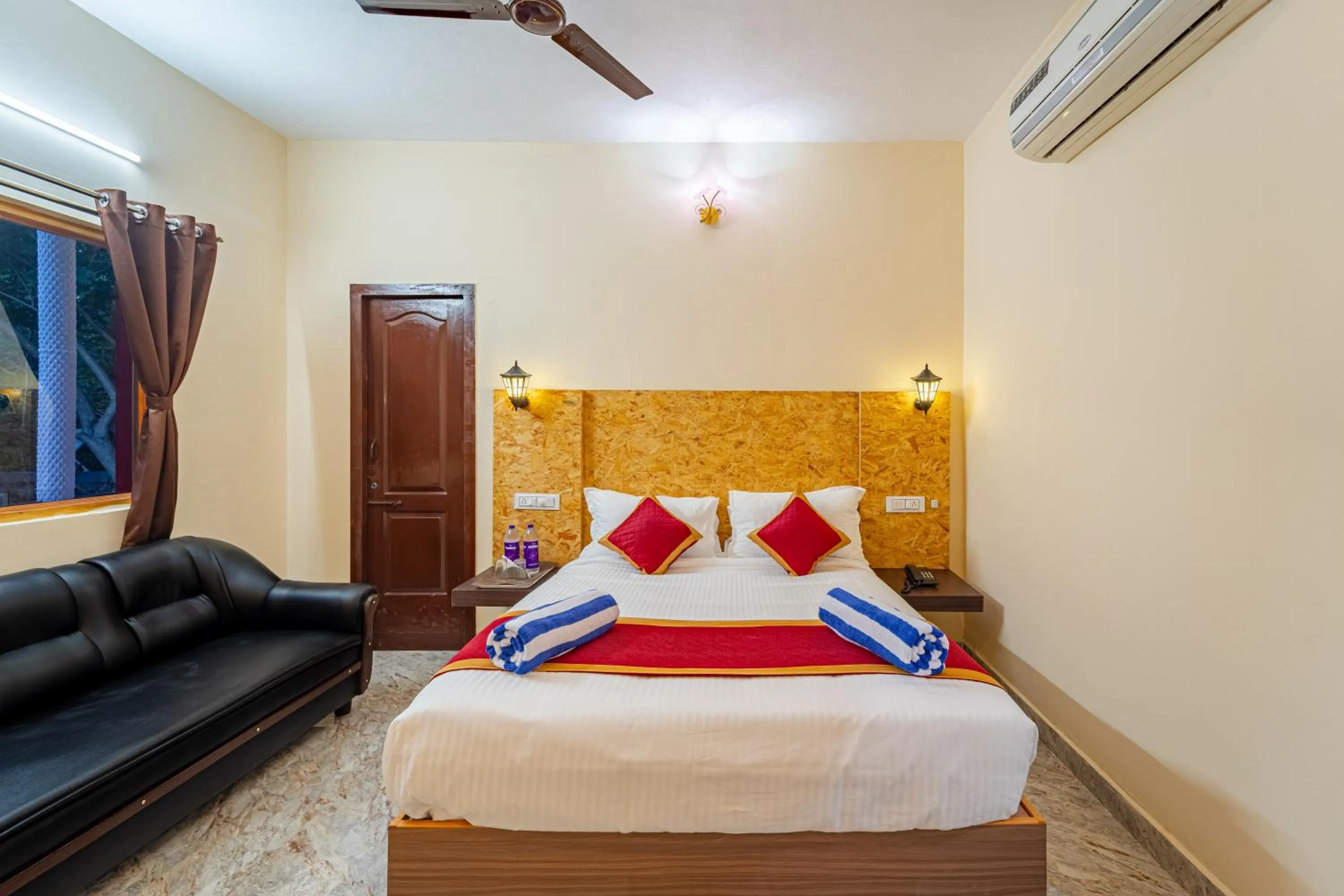 air conditioner, Bed in Hotel De Jardin Pondicherry with Swimming Pool