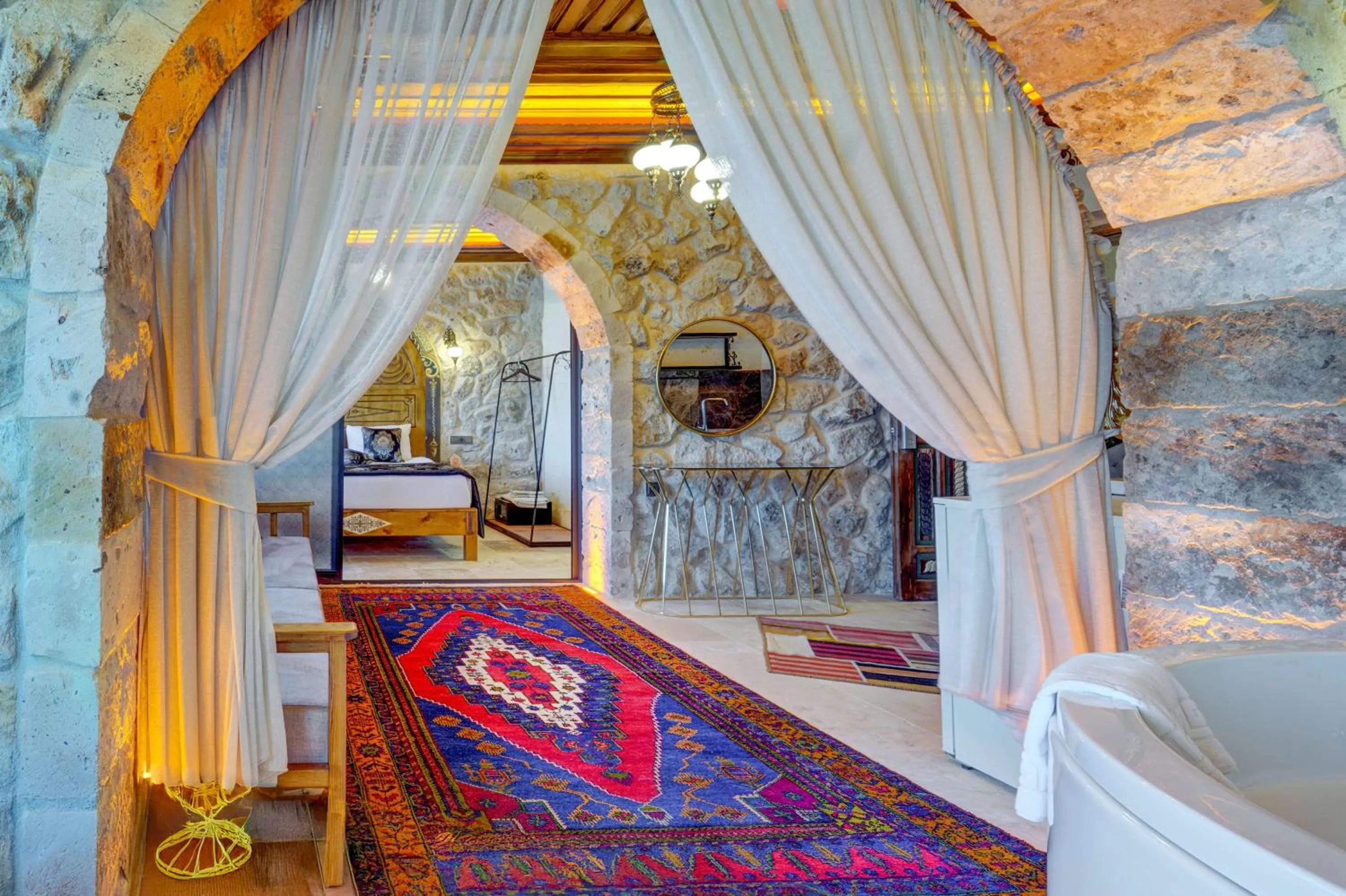 Seating area, Bed in Kasr-ı Kapadokya Cave Suites
