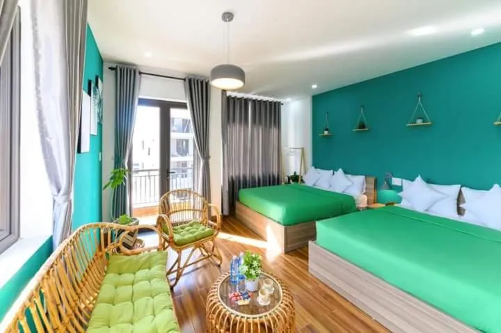 Photo of the whole room, Bed in Kivi Homestay Hoi An