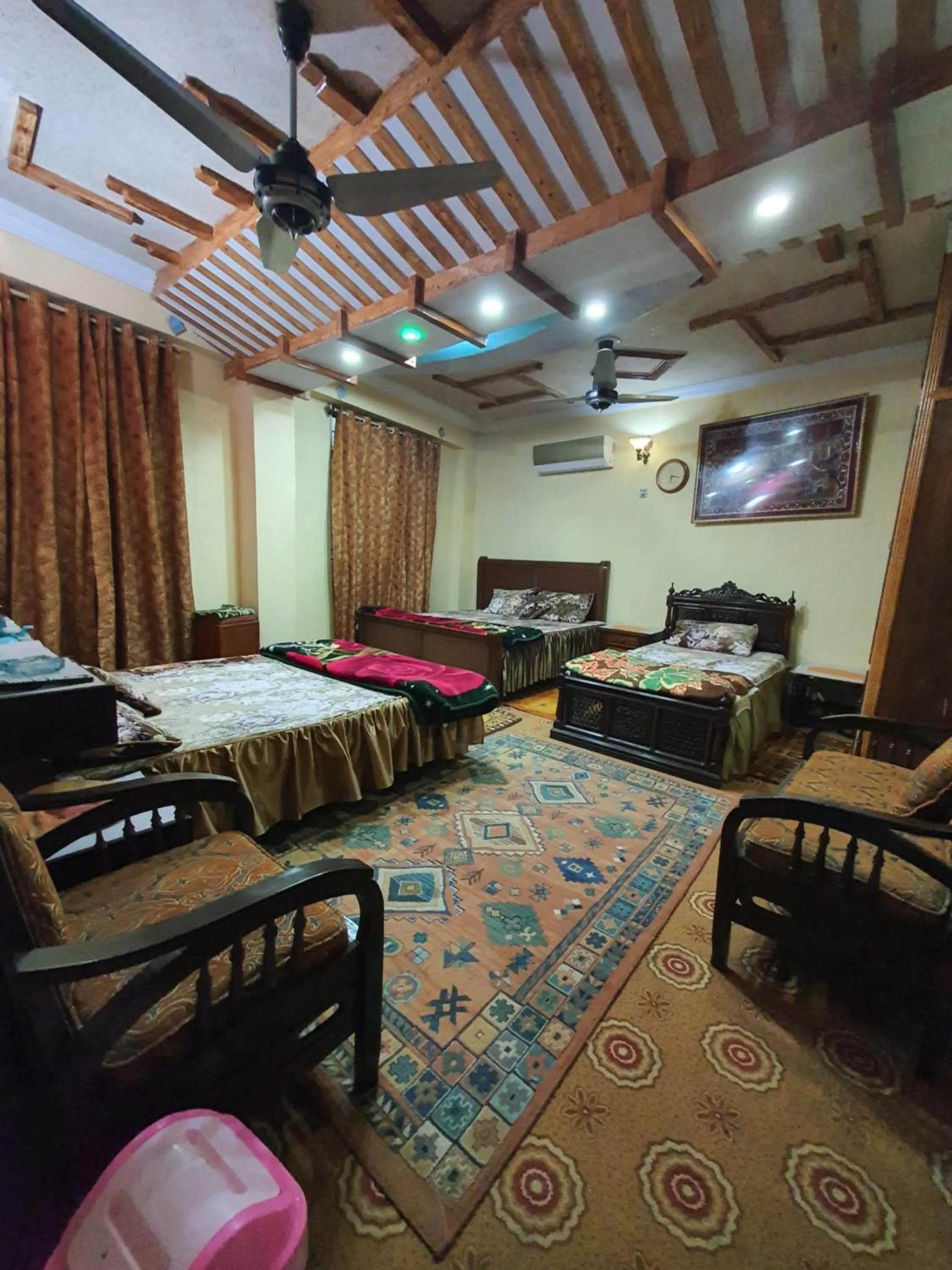 Communal lounge/ TV room in AK Hotel Abbottabad