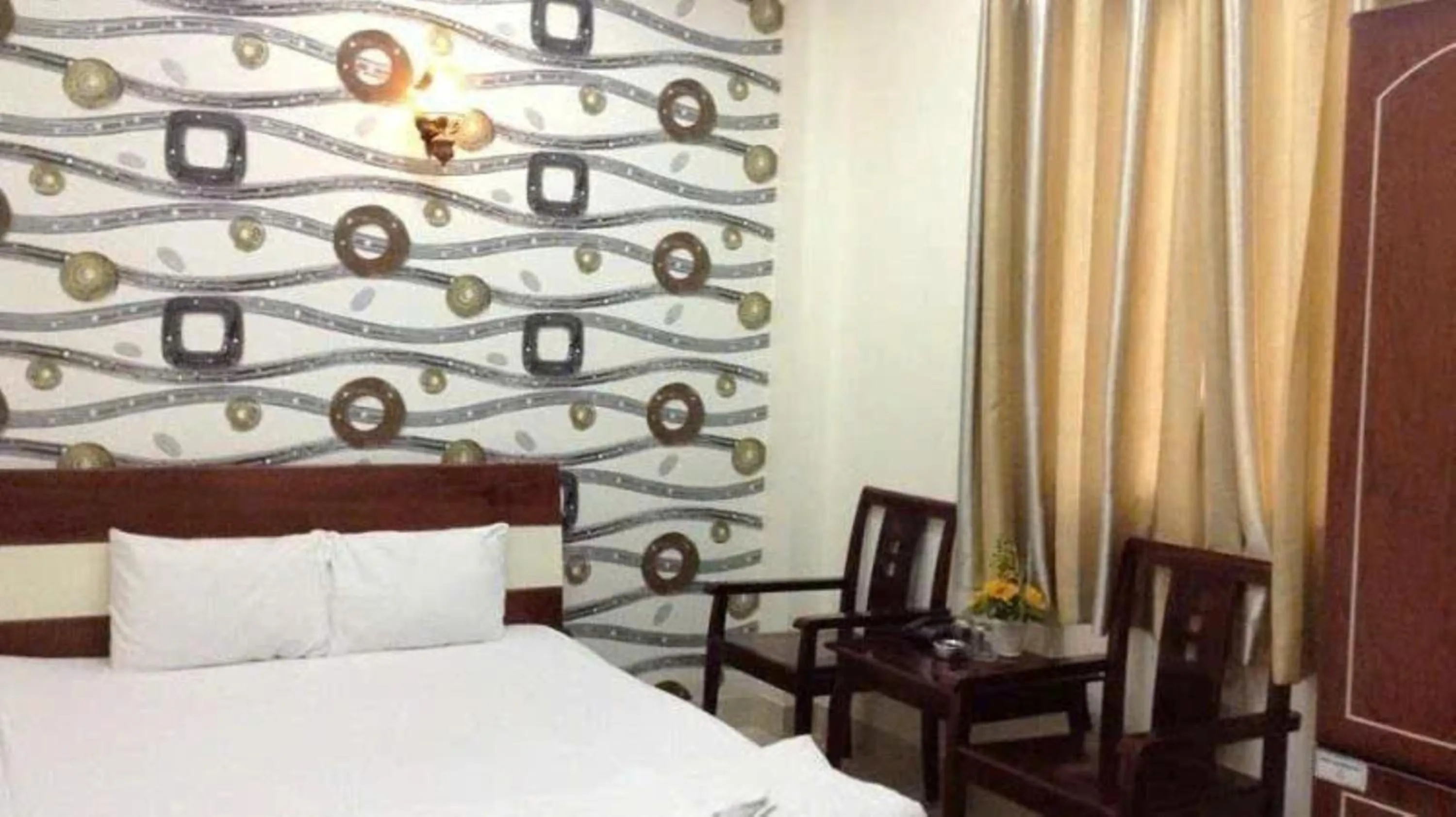 Bed in Quang Huy Hotel