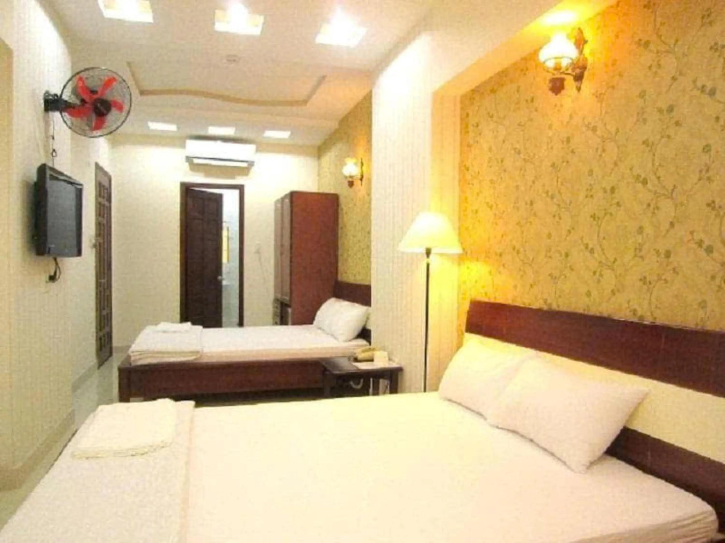 Bed in Quang Huy Hotel