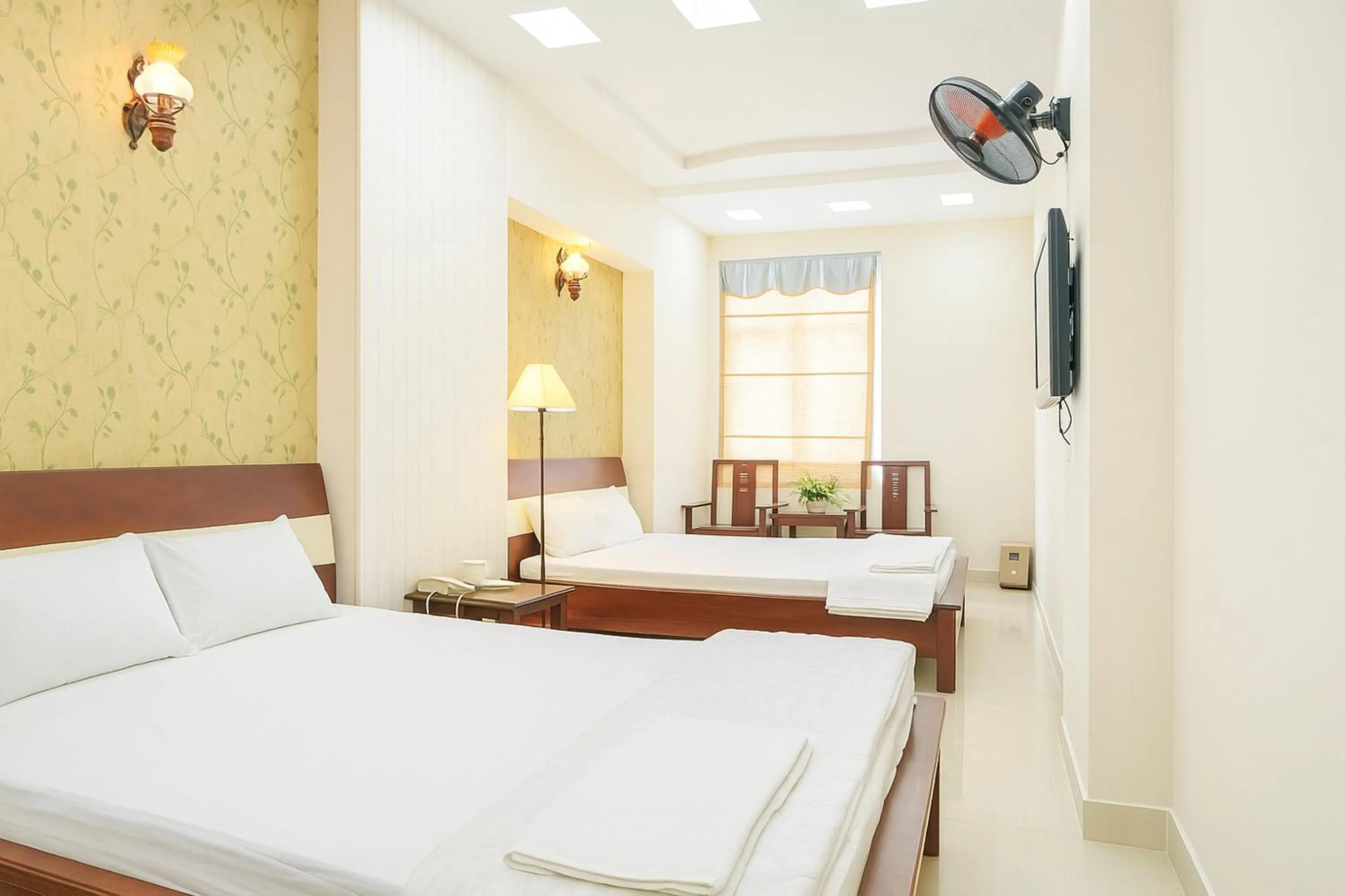 Bed in Quang Huy Hotel