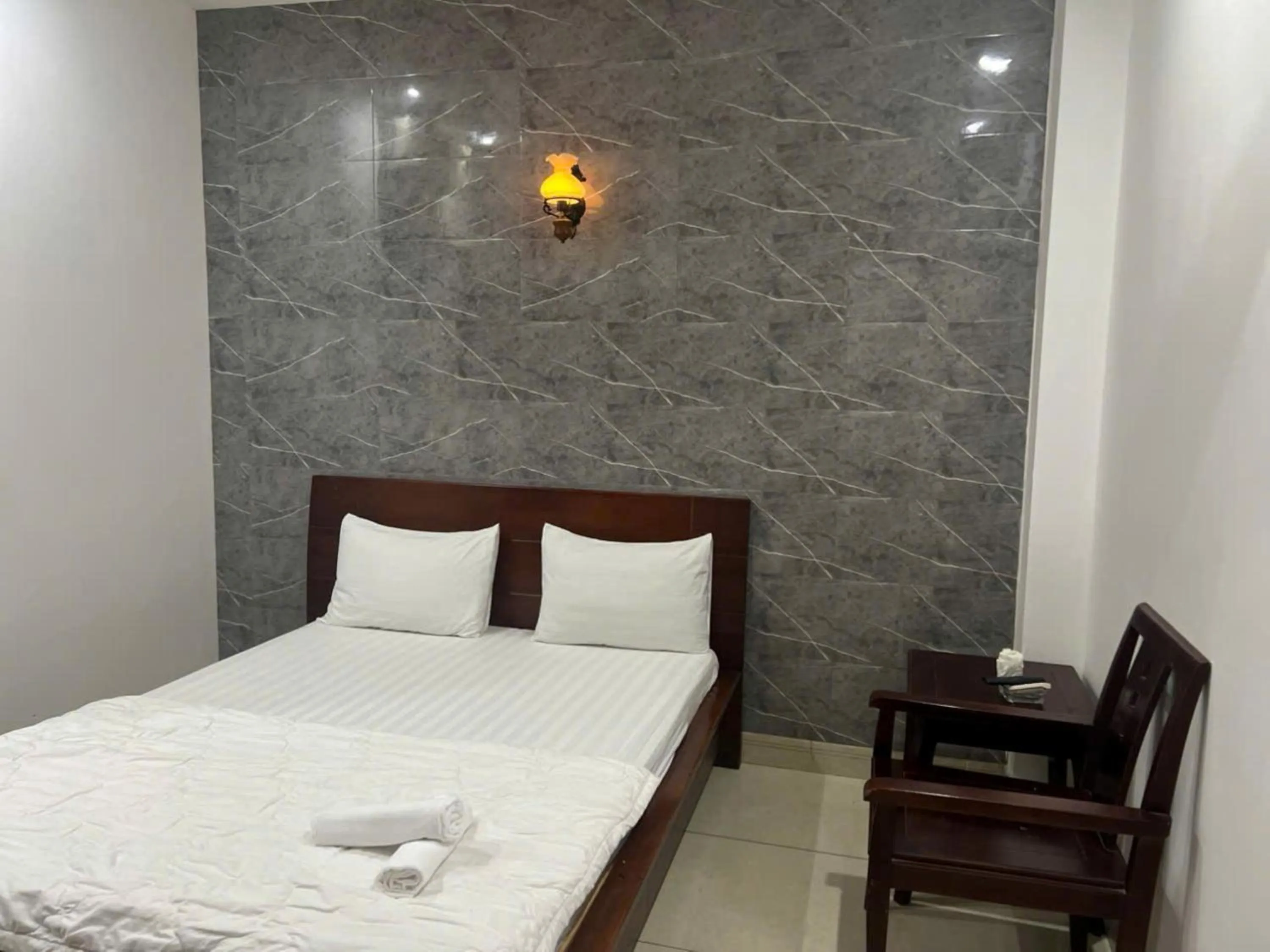 Bed in Quang Huy Hotel