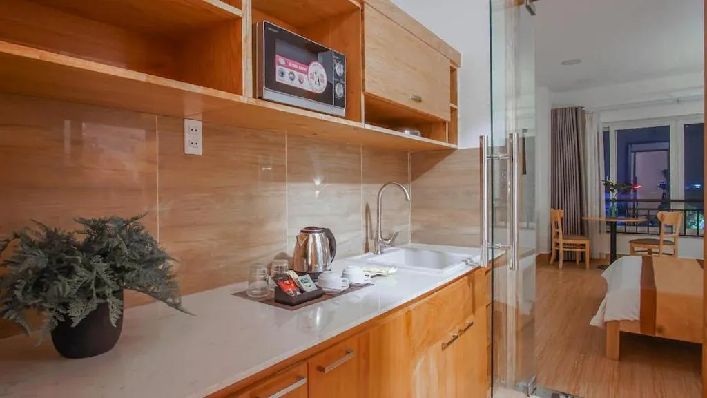 Kitchen or kitchenette in ARTMIO Hotel Apartment