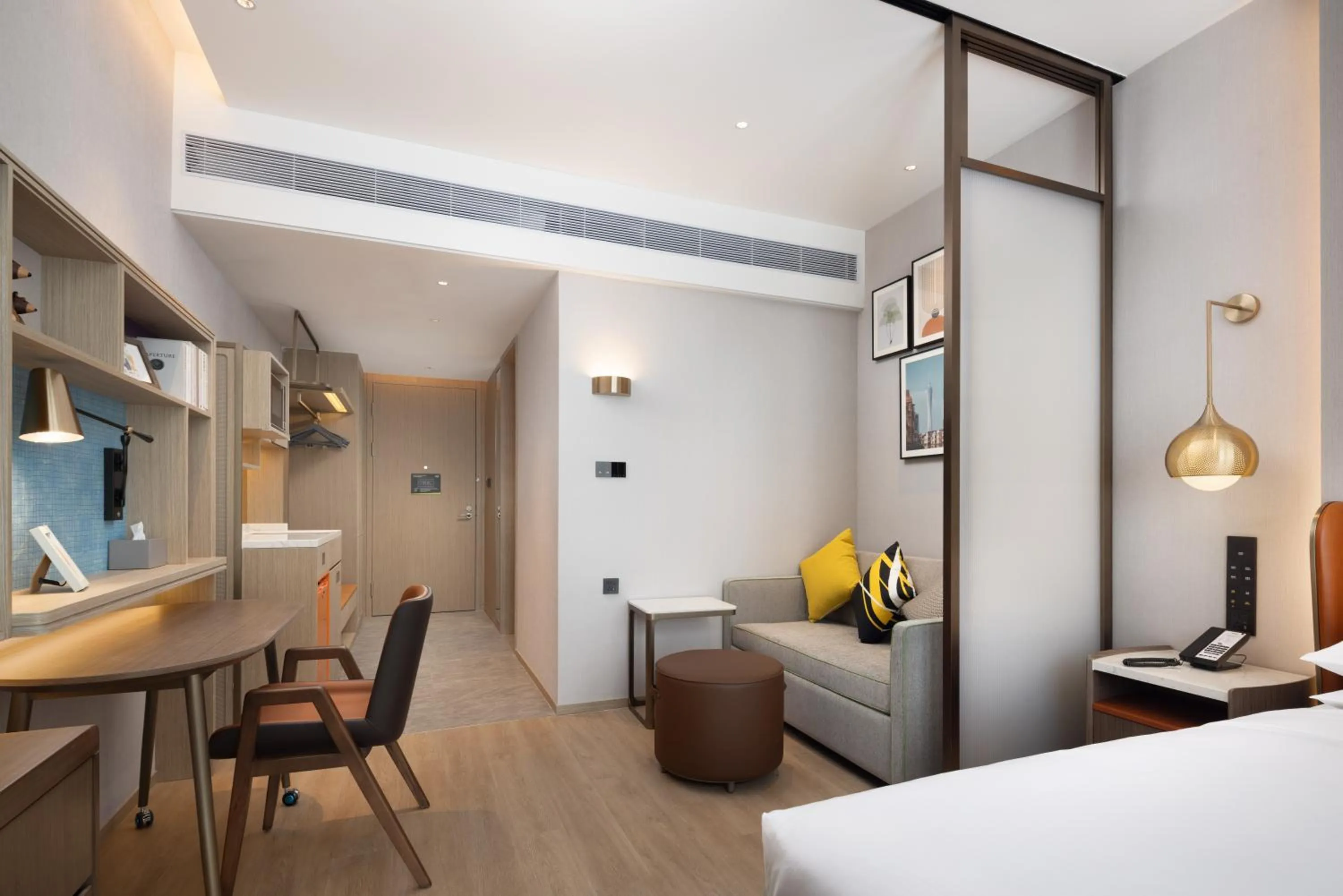 Living room, Bed in Home2 Suites by Hilton Guangzhou Huangpu Science City Free shuttle buses are provided during the Canton Fair