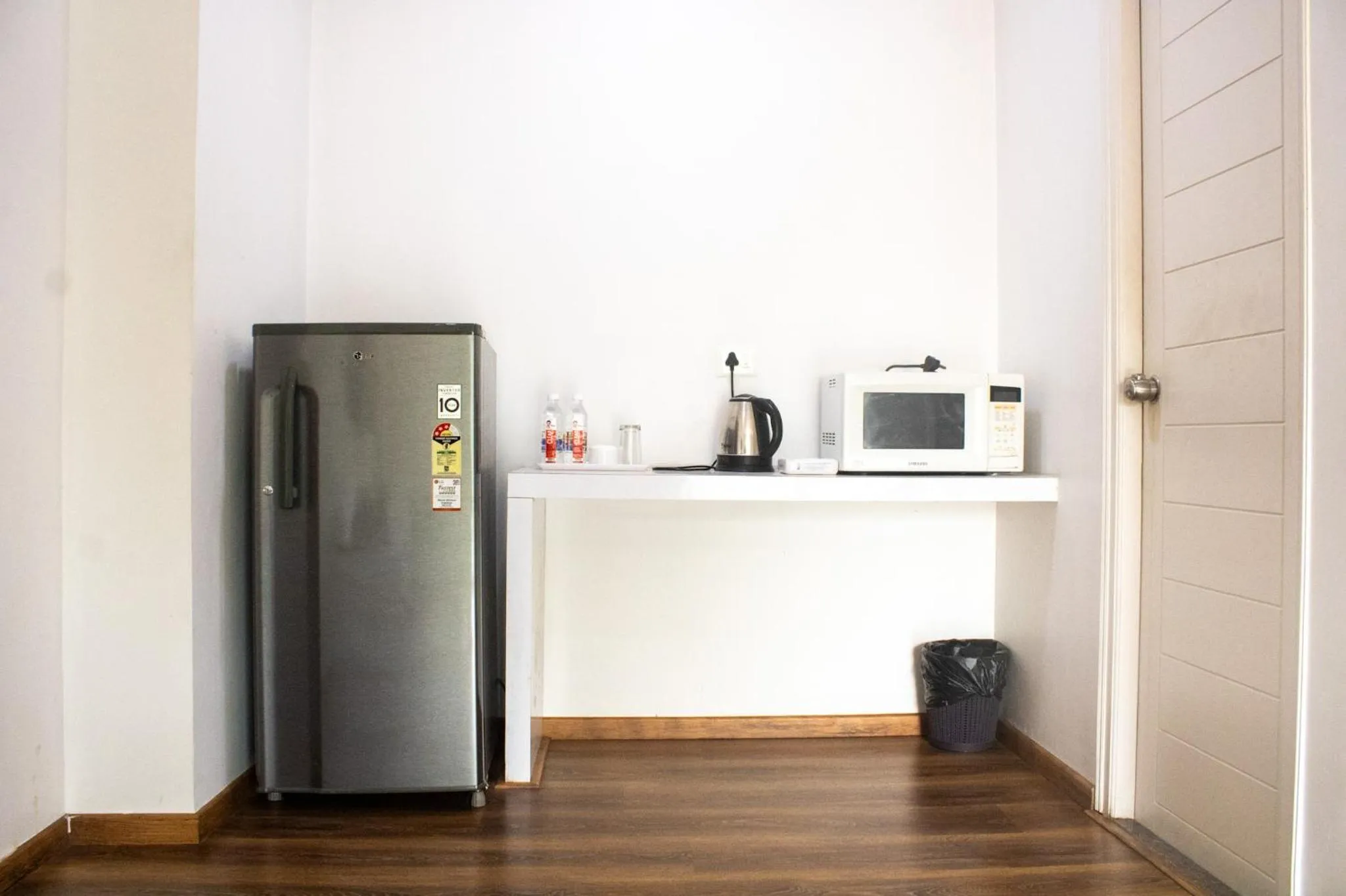 Kitchen or kitchenette in Mystic Hotel Koramangala