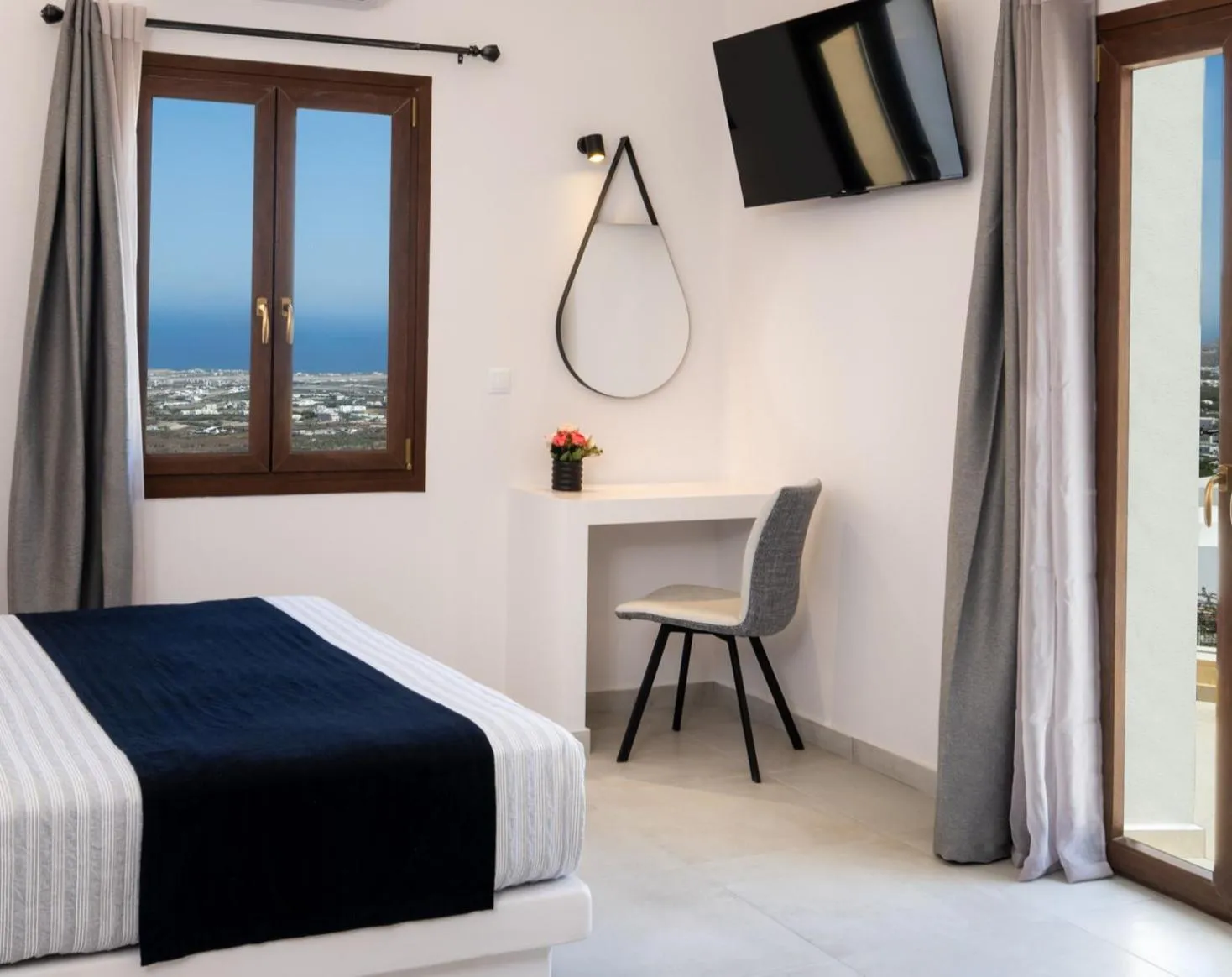 Bed in Santorinn Suites Fira