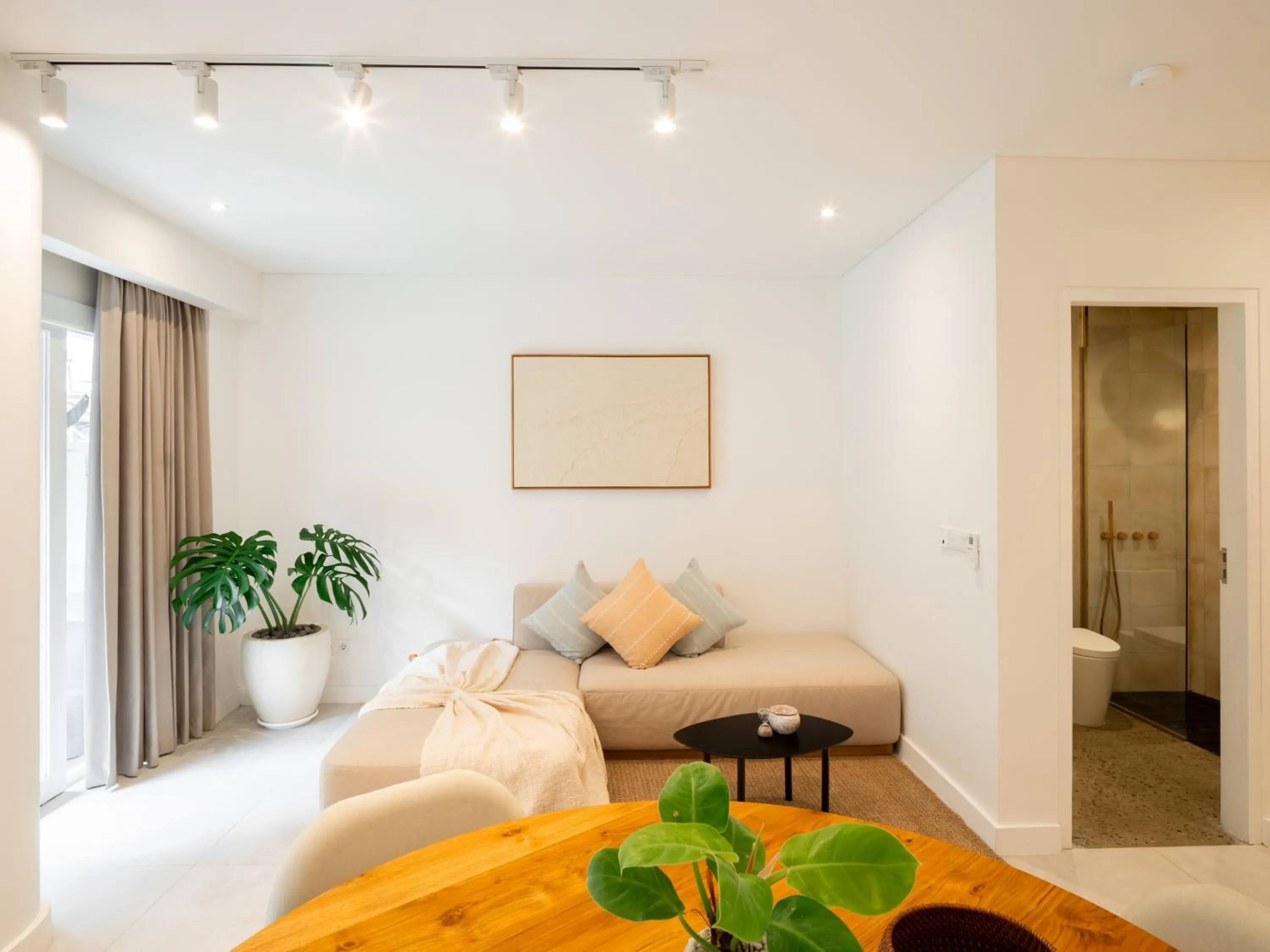 Living room, Bed in The Cruise Berawa - Design Apartments & Penthouses by CPM Bali