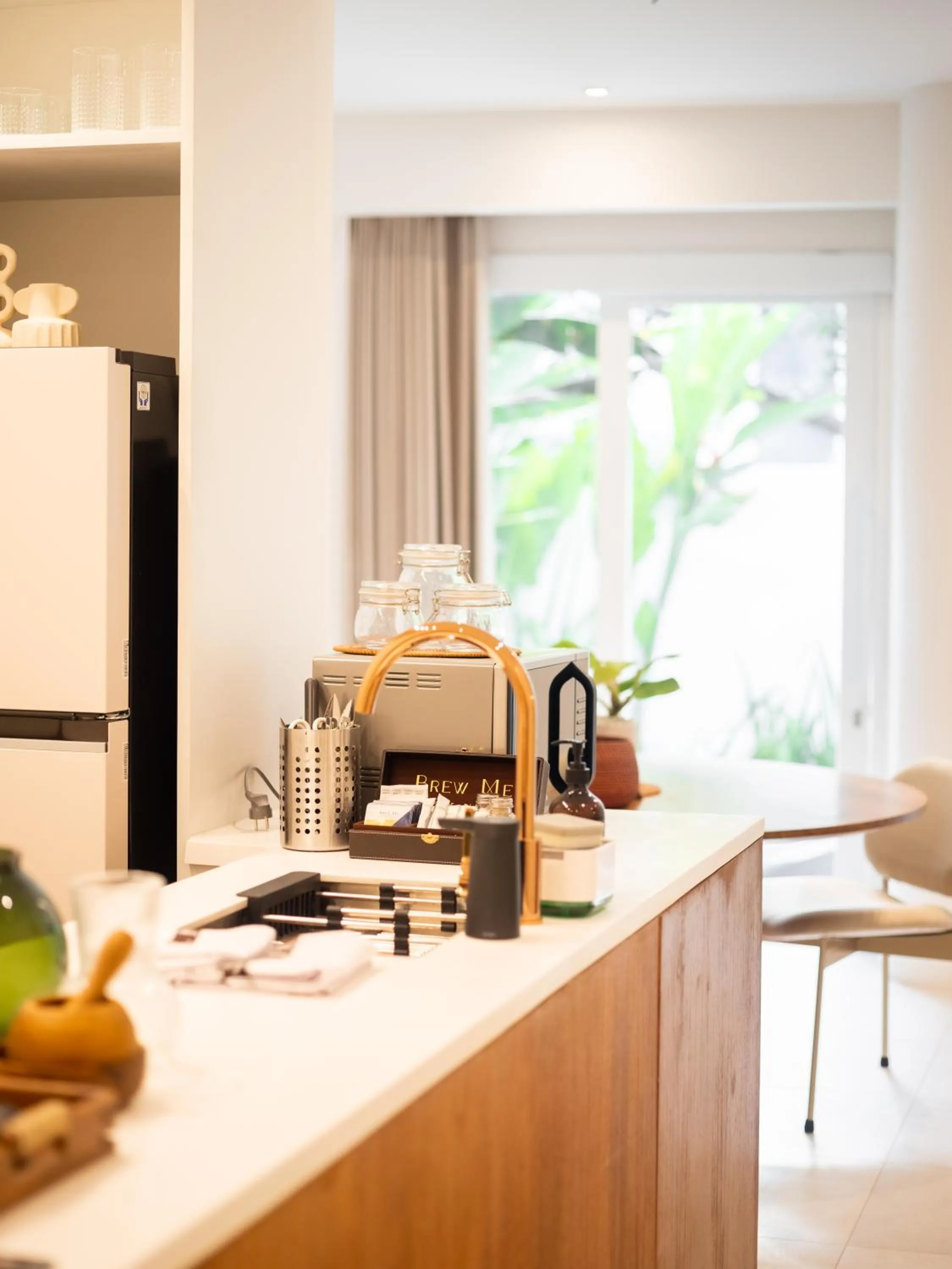 Kitchen or kitchenette in The Cruise Berawa - Design Apartments & Penthouses by CPM Bali