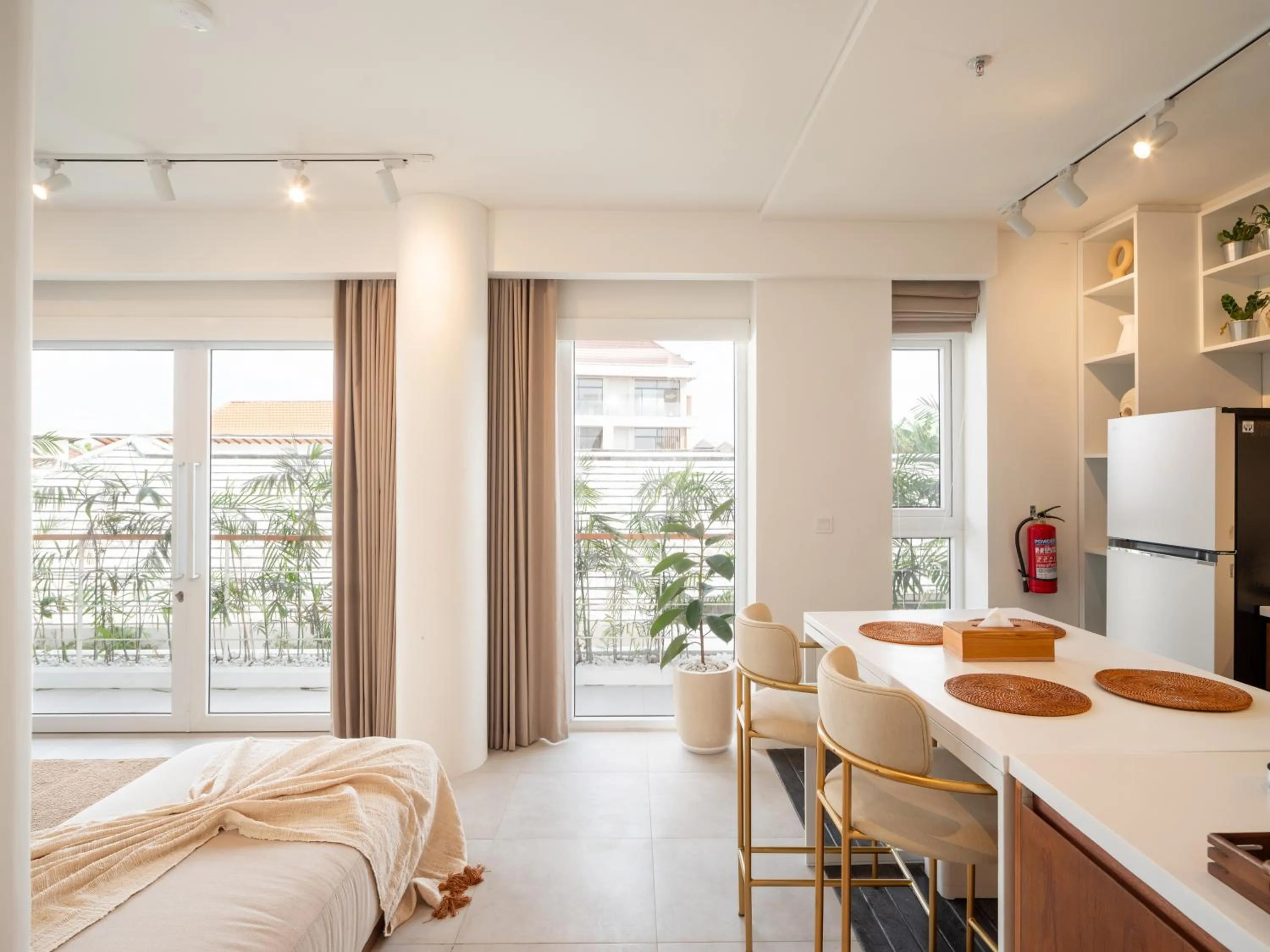 Living room, Bed in The Cruise Berawa - Design Apartments & Penthouses by CPM Bali