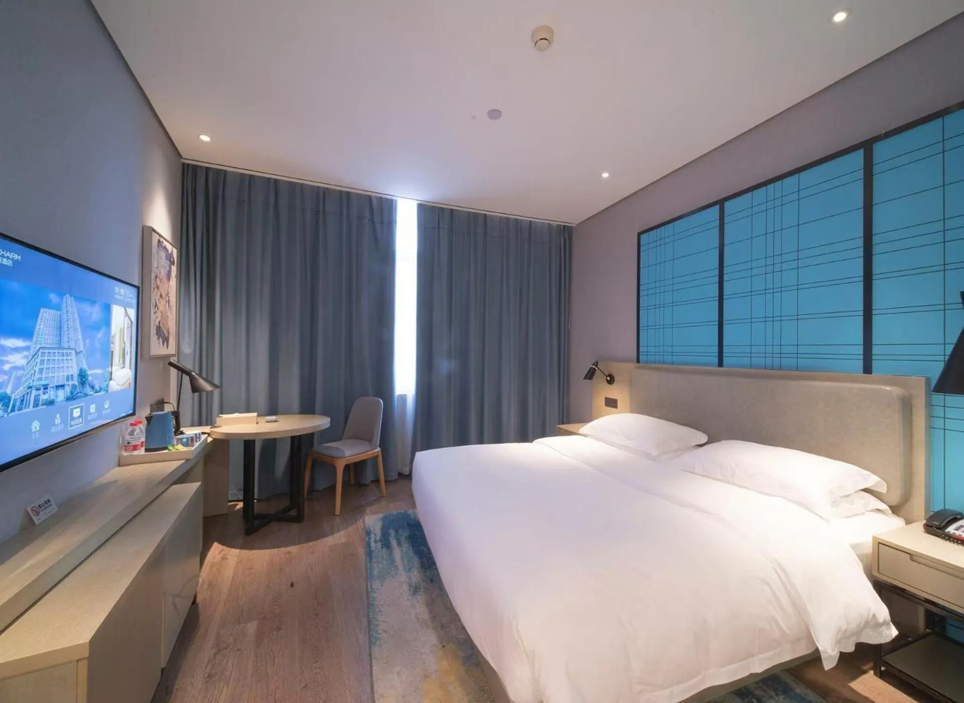 Bed in Echarm Hotel Wuhan Caidian Street Linzhang Avenue Metro Station
