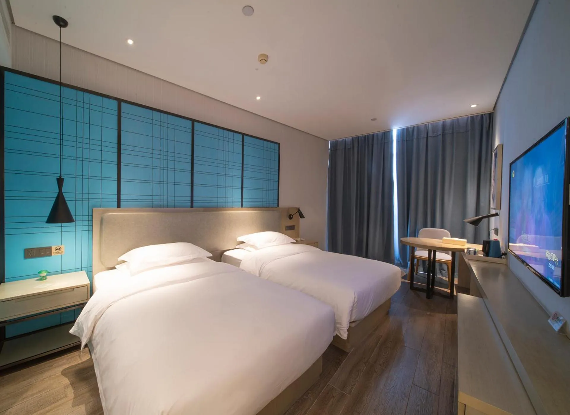 Bed in Echarm Hotel Wuhan Caidian Street Linzhang Avenue Metro Station