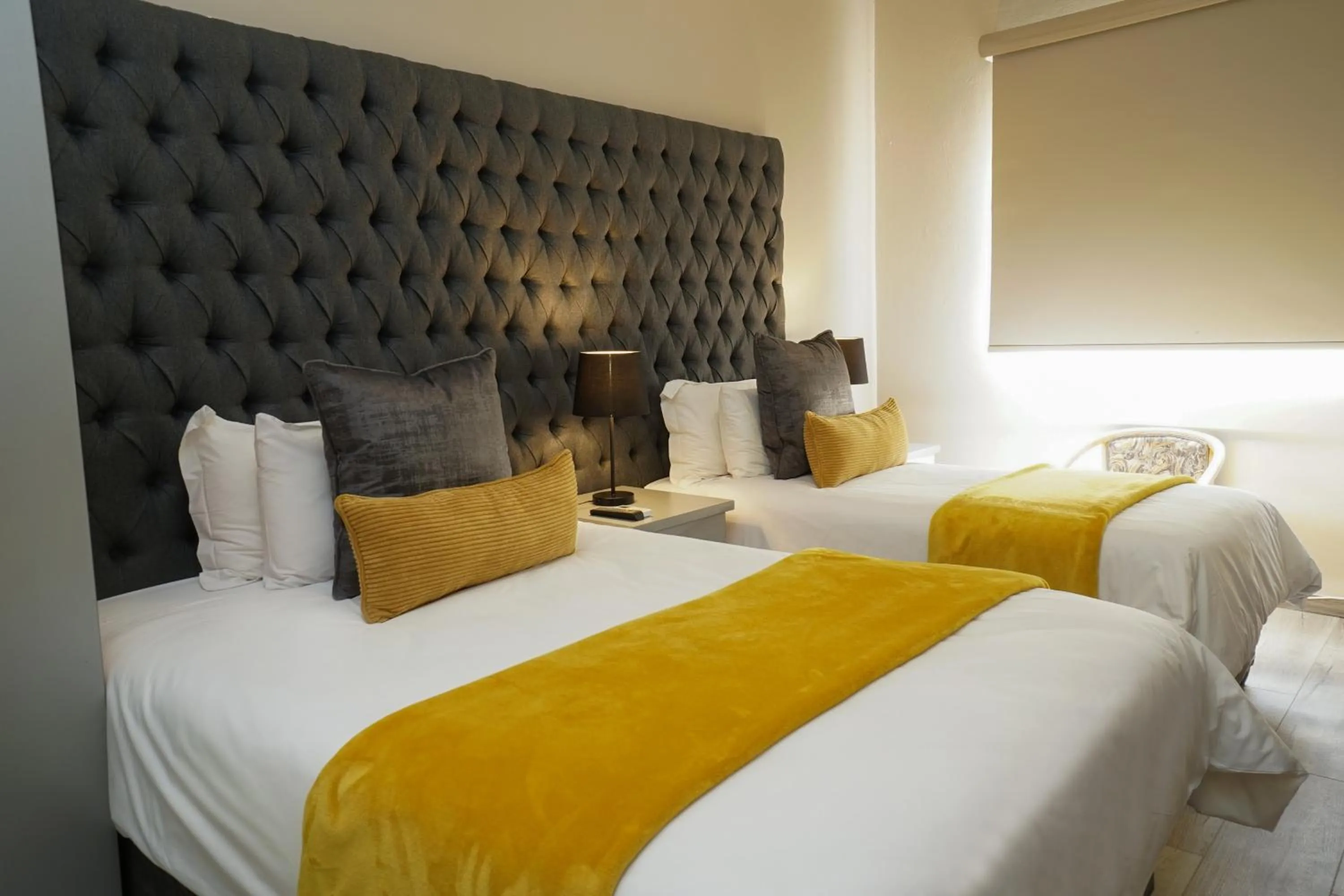 Bed in Inani Hotel Gallagher