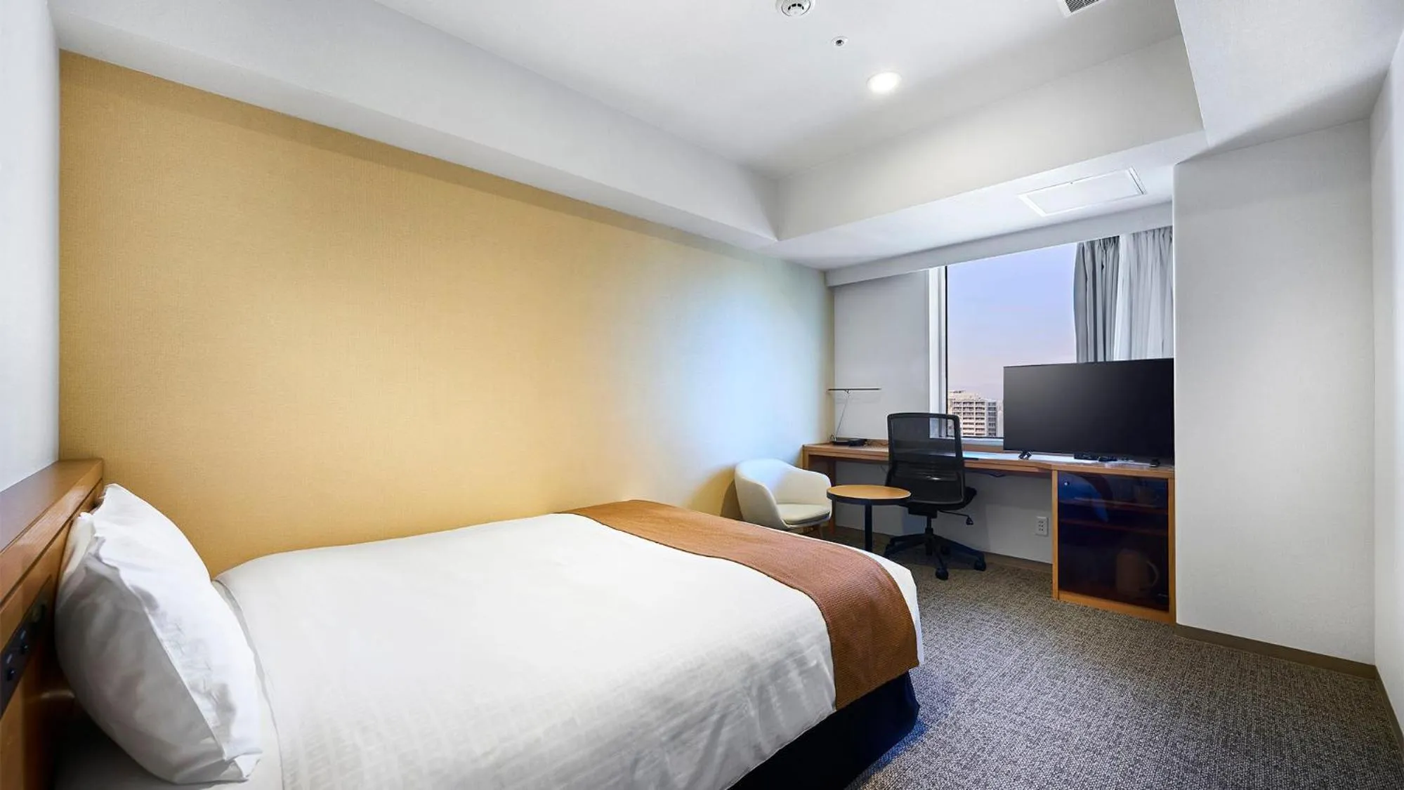 Bed in Daiwa Roynet Hotel Nagoya Shinkansenguchi