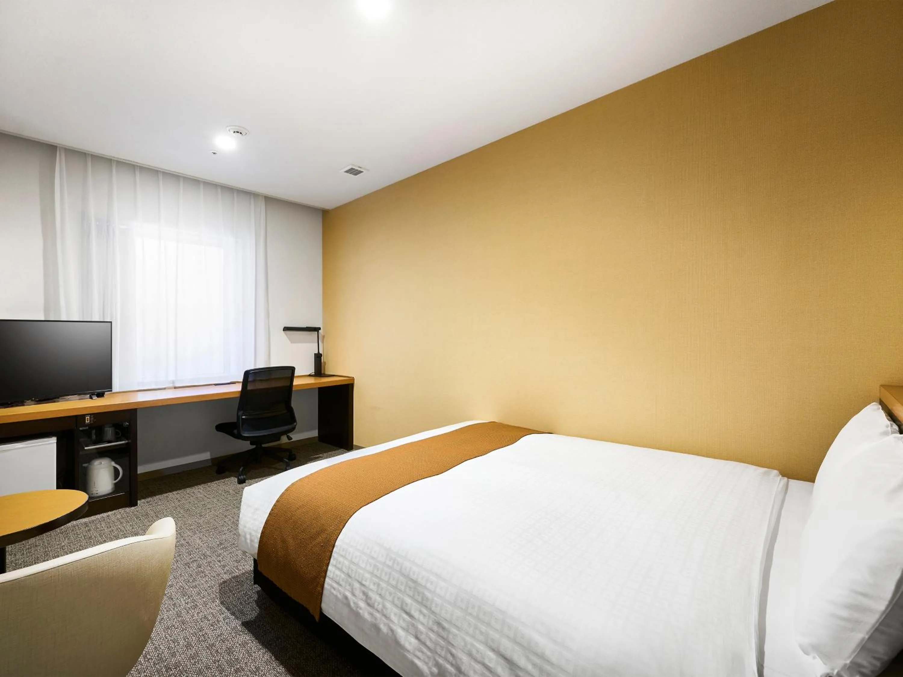 Bed in Daiwa Roynet Hotel Nagoya Shinkansenguchi