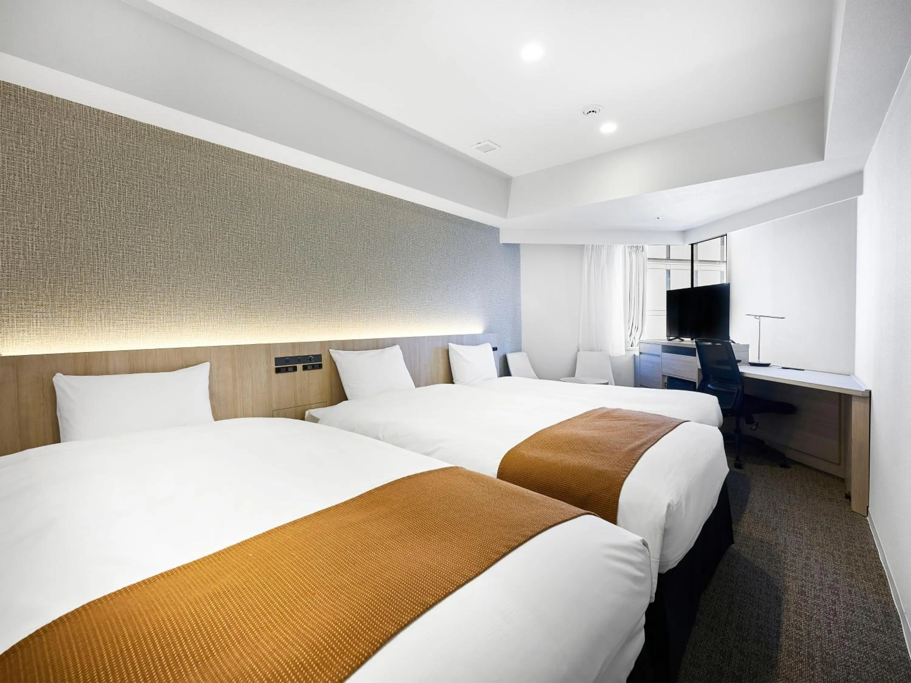 Bed in Daiwa Roynet Hotel Nagoya Shinkansenguchi