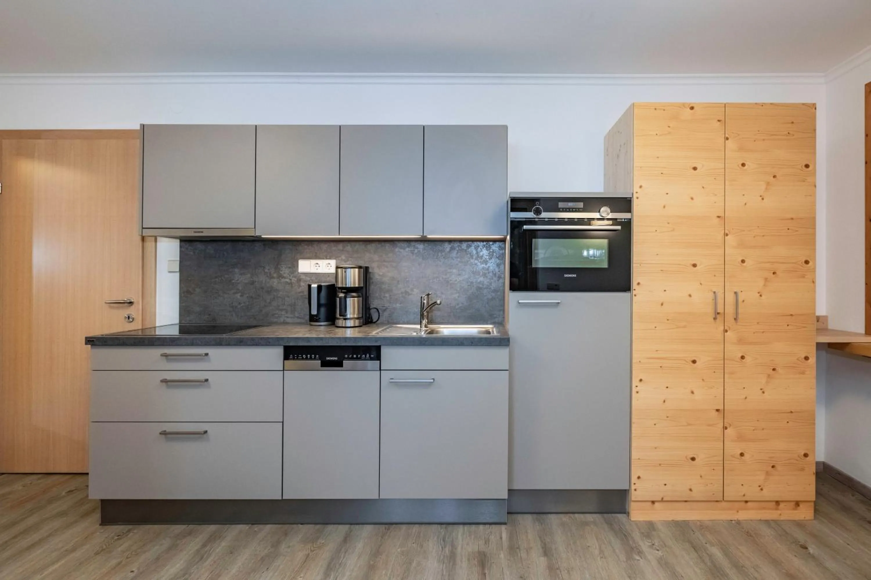 kitchen in nawu apartments & Restaurant