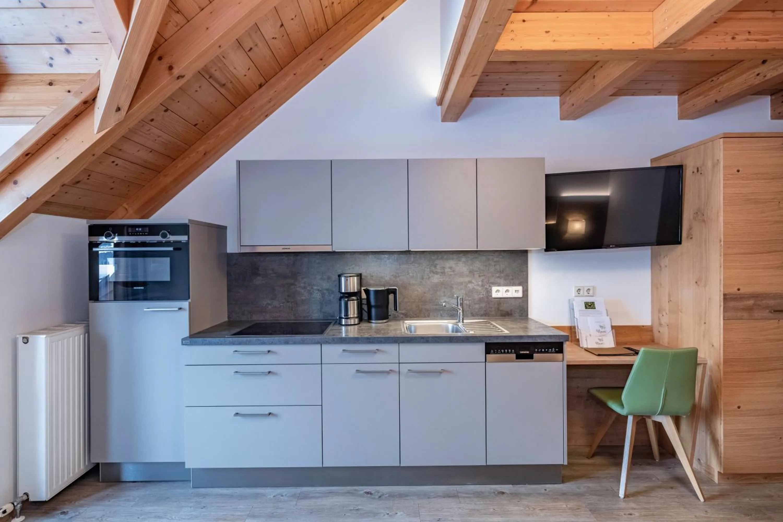 kitchen in nawu apartments & Restaurant