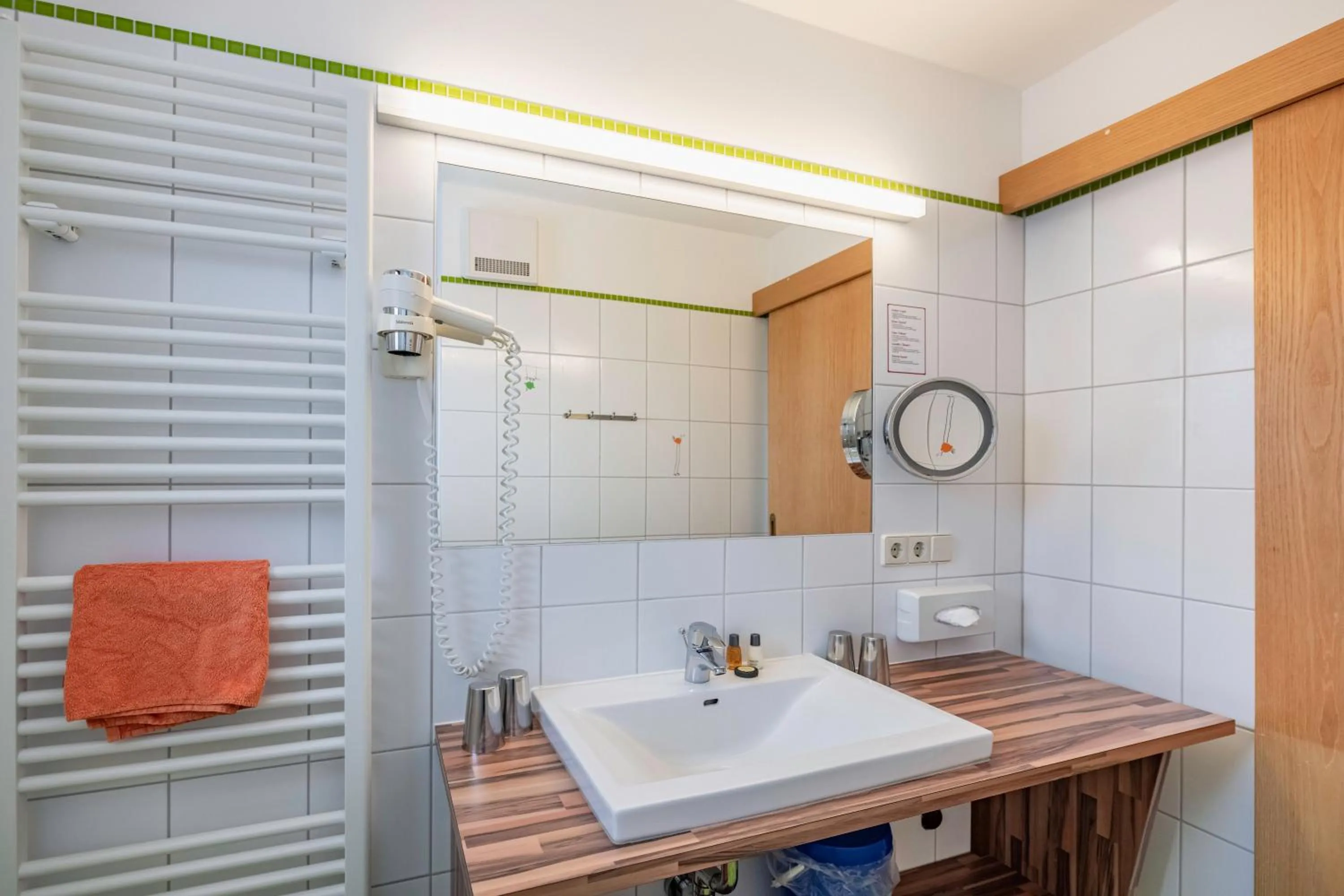 Bathroom in nawu apartments & Restaurant