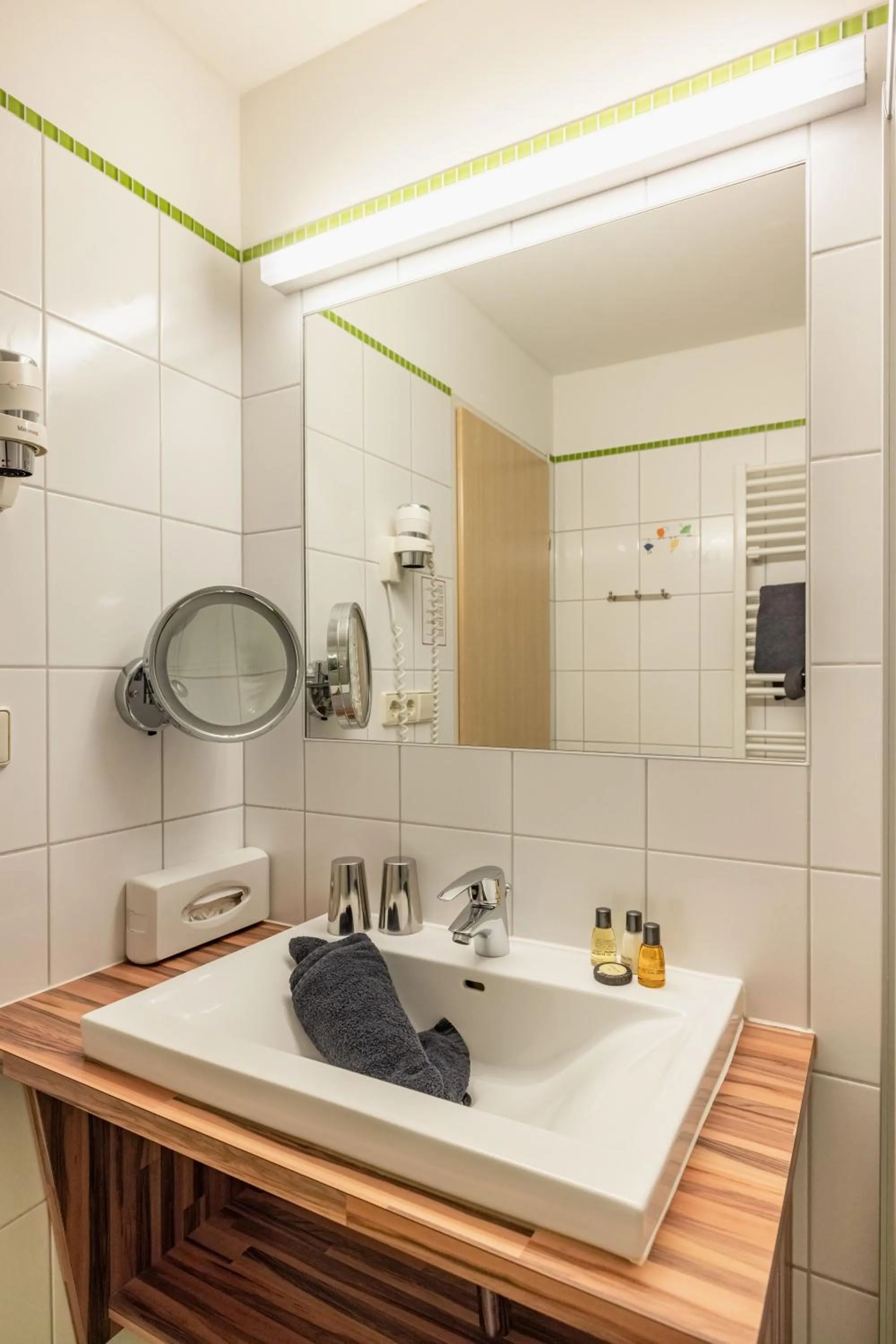 Shower in nawu apartments & Restaurant