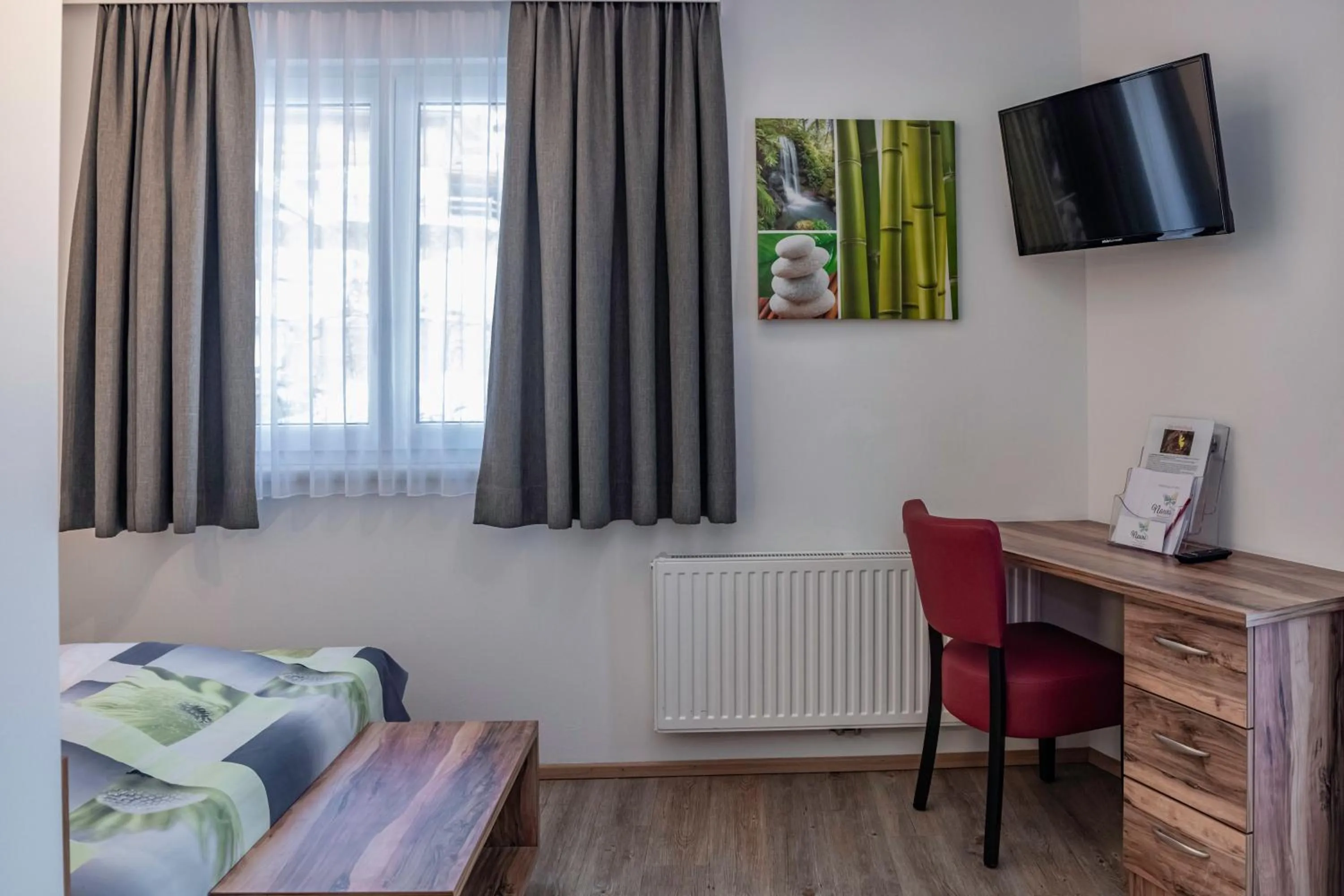 Photo of the whole room, Bed in nawu apartments & Restaurant