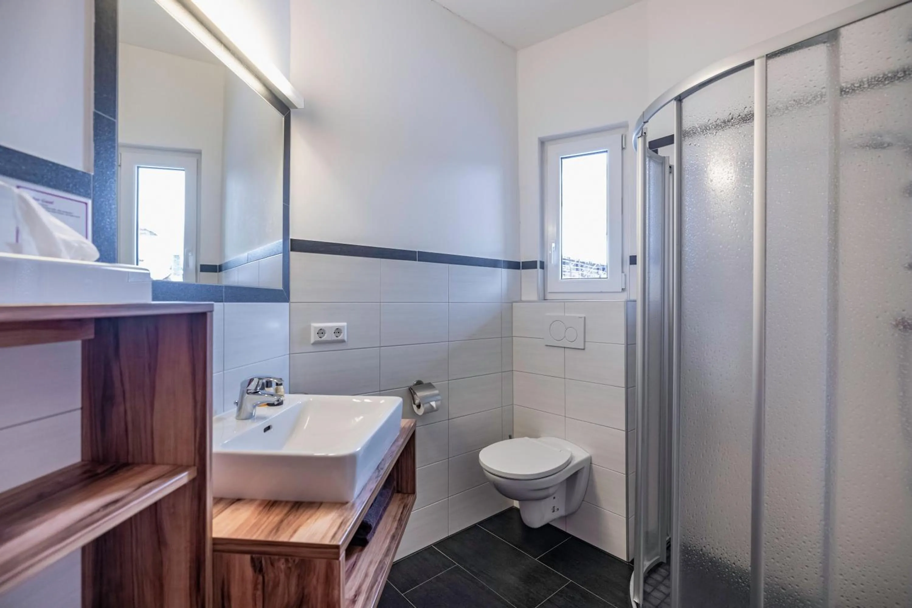 Bathroom in nawu apartments & Restaurant