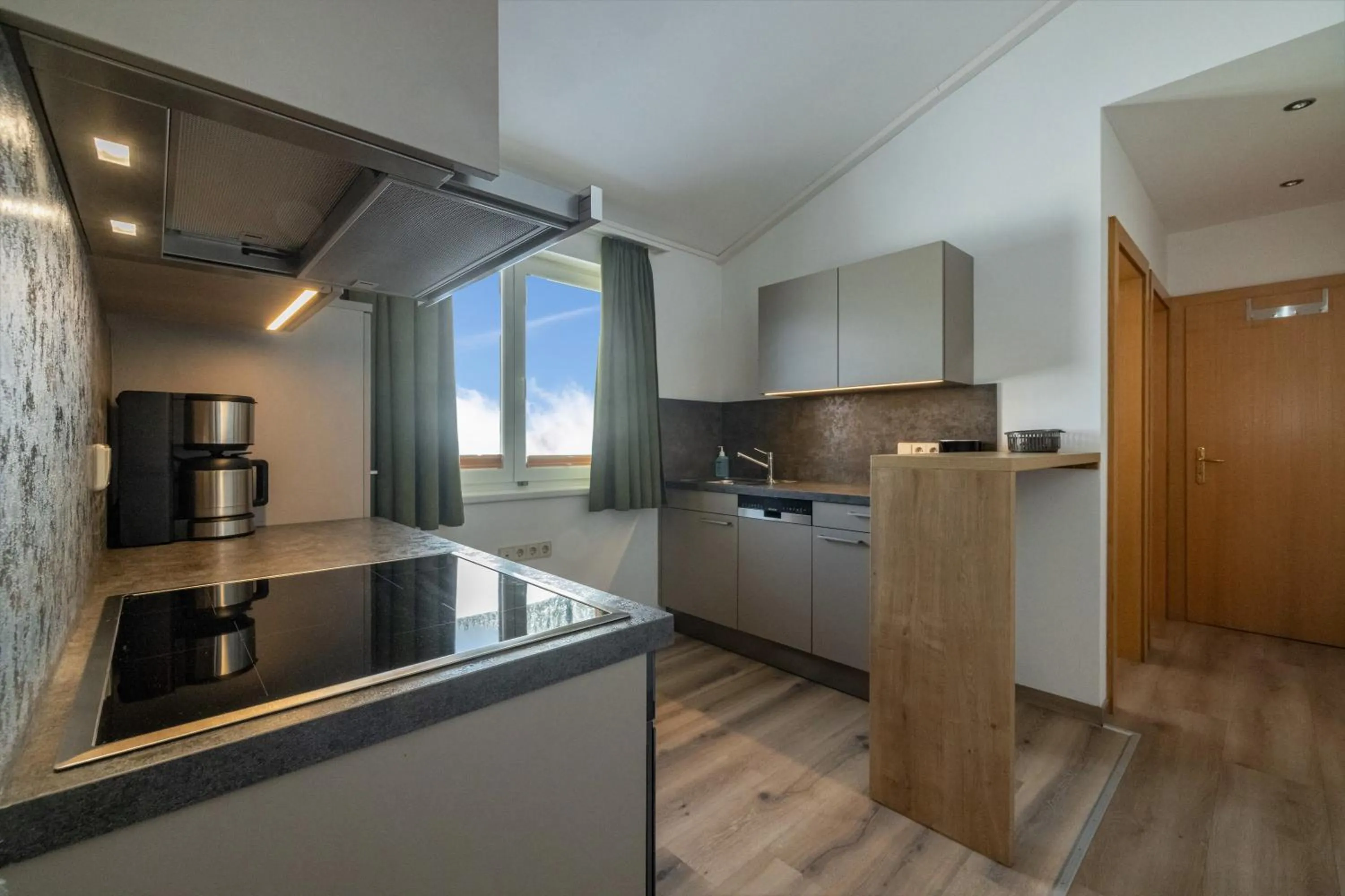 kitchen in nawu apartments & Restaurant