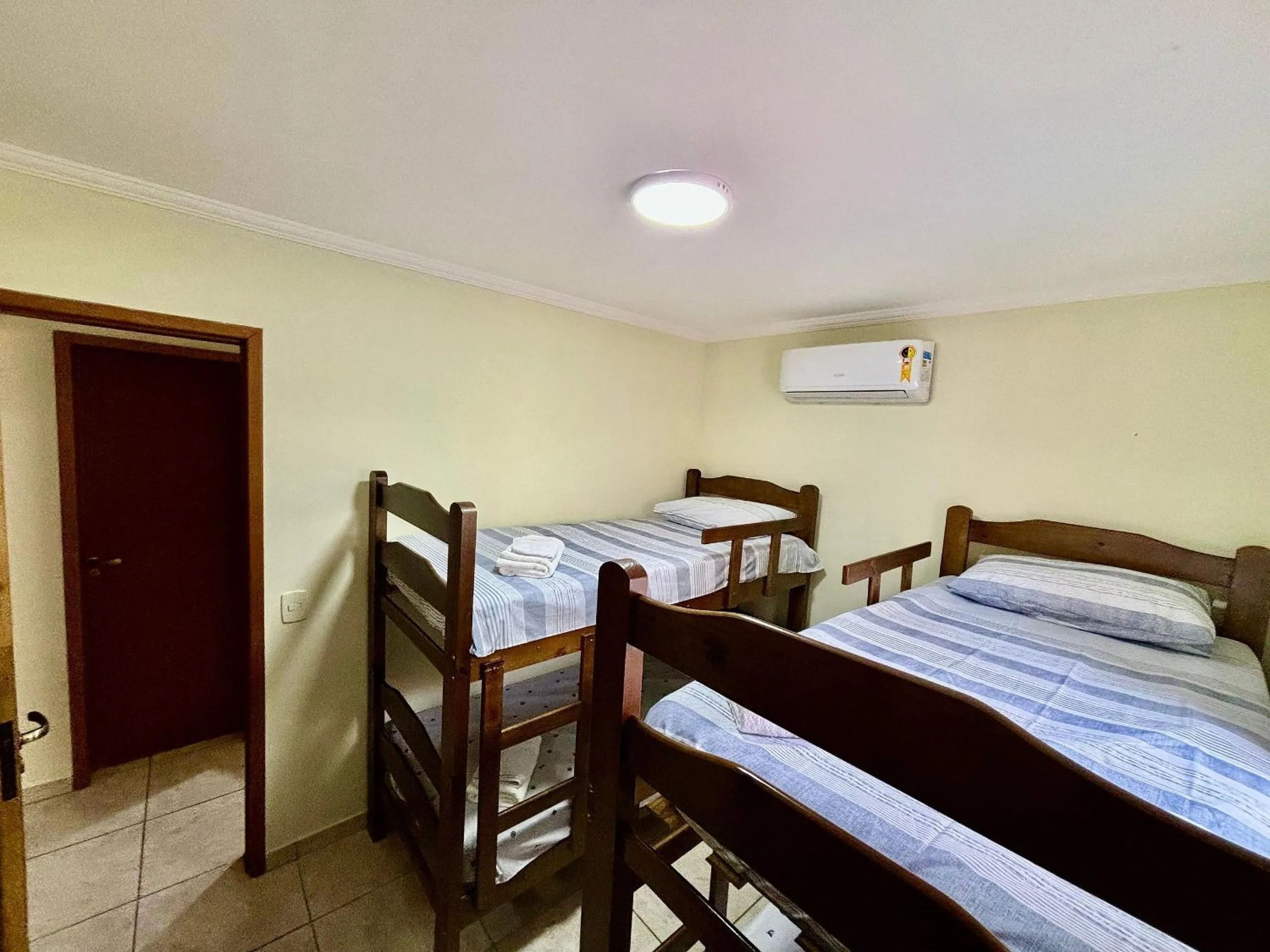 Bed in Lindo Apto em Ubatuba/SP - Toninhas c/Ar