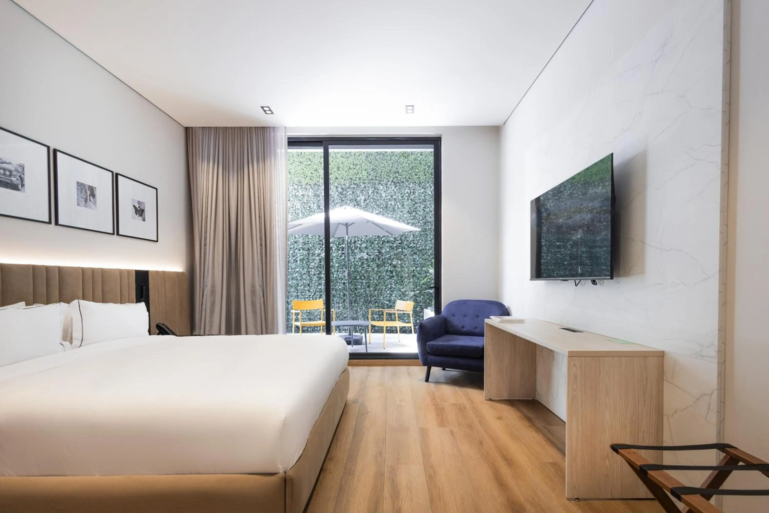 Bed in Vuestro Hotel Boutique