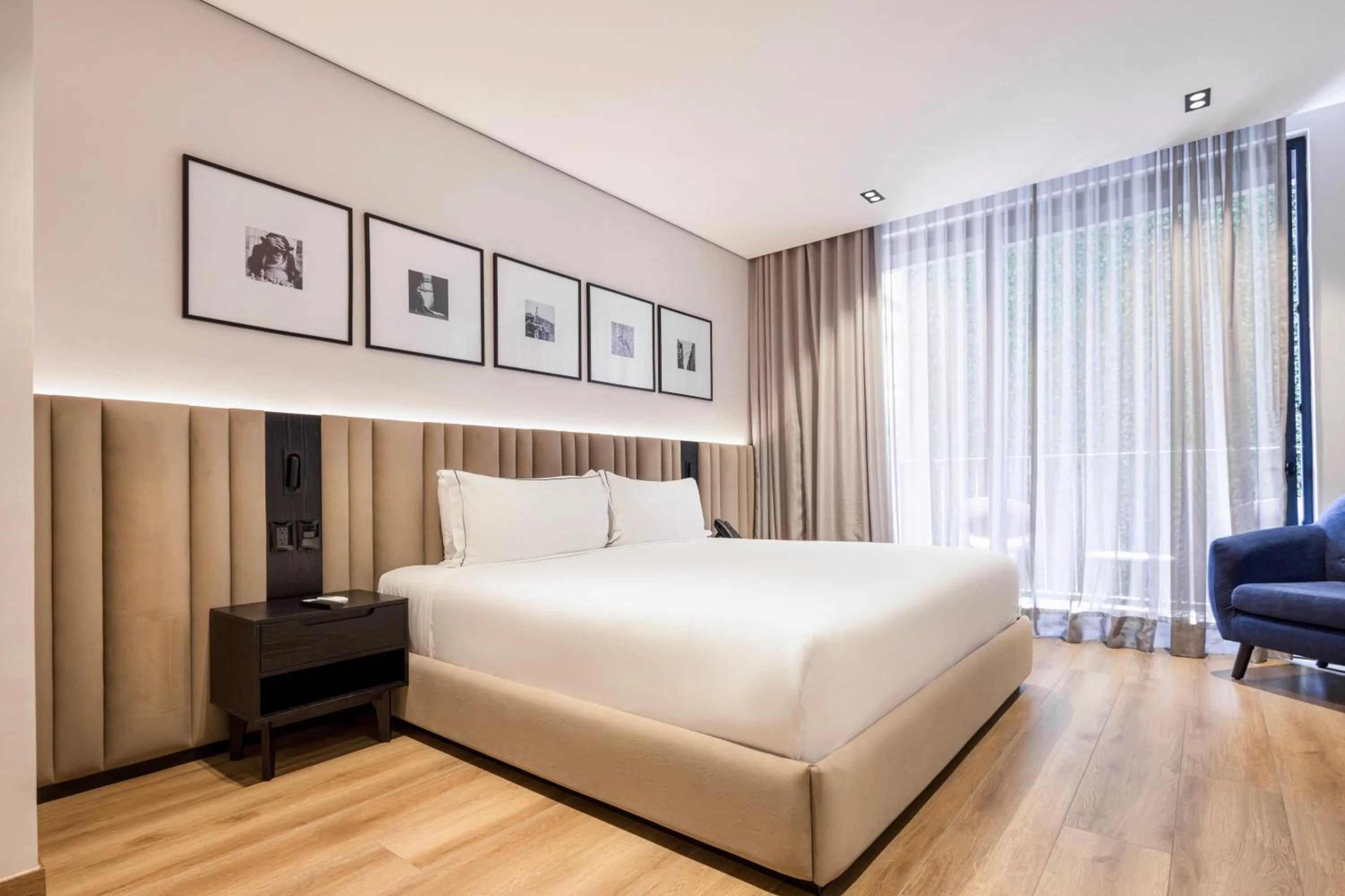 Bed in Vuestro Hotel Boutique