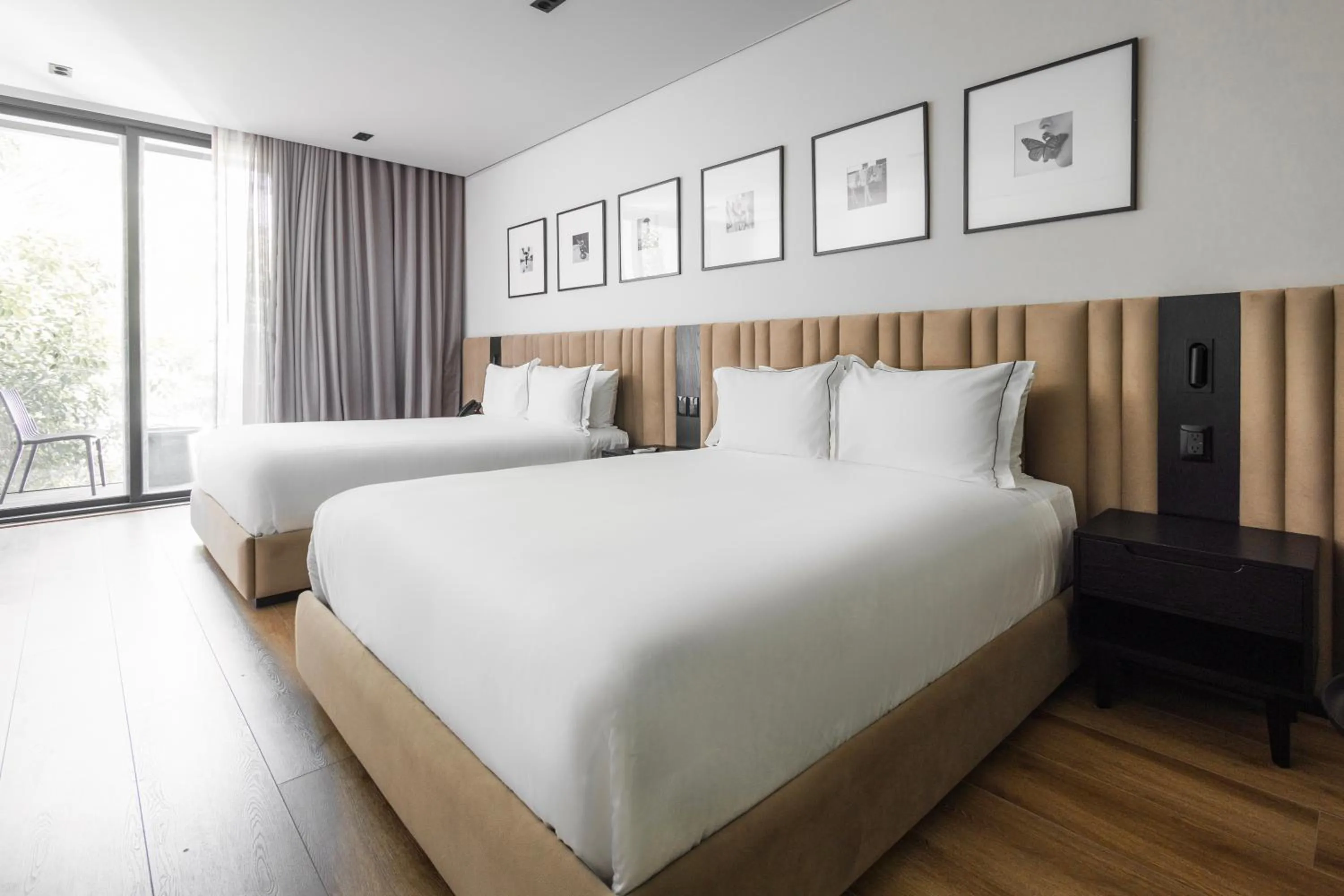 Bed in Vuestro Hotel Boutique