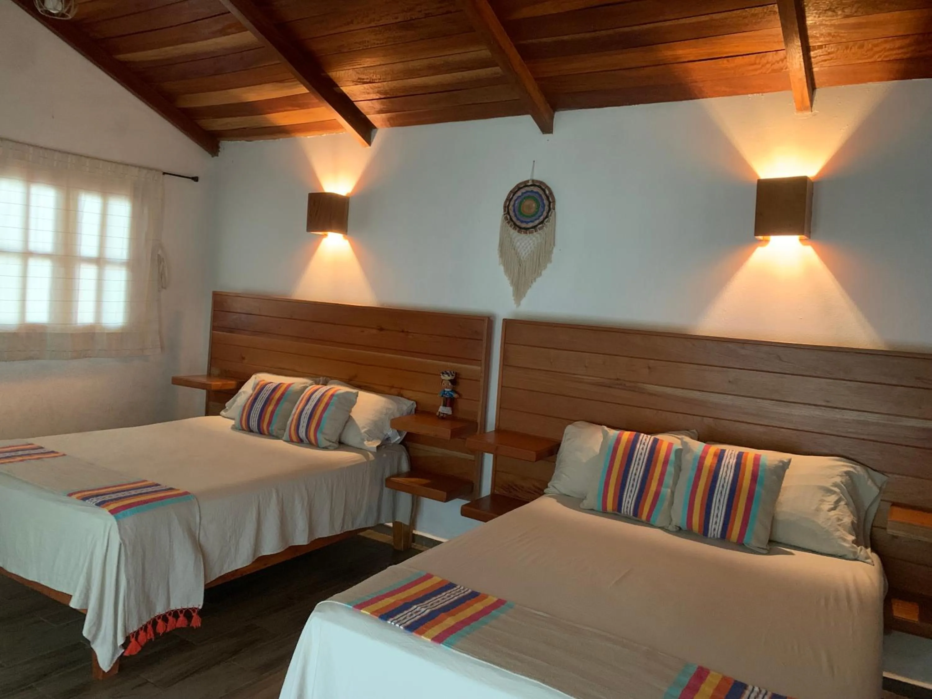 Bed in Hotel Quiloma Ranch