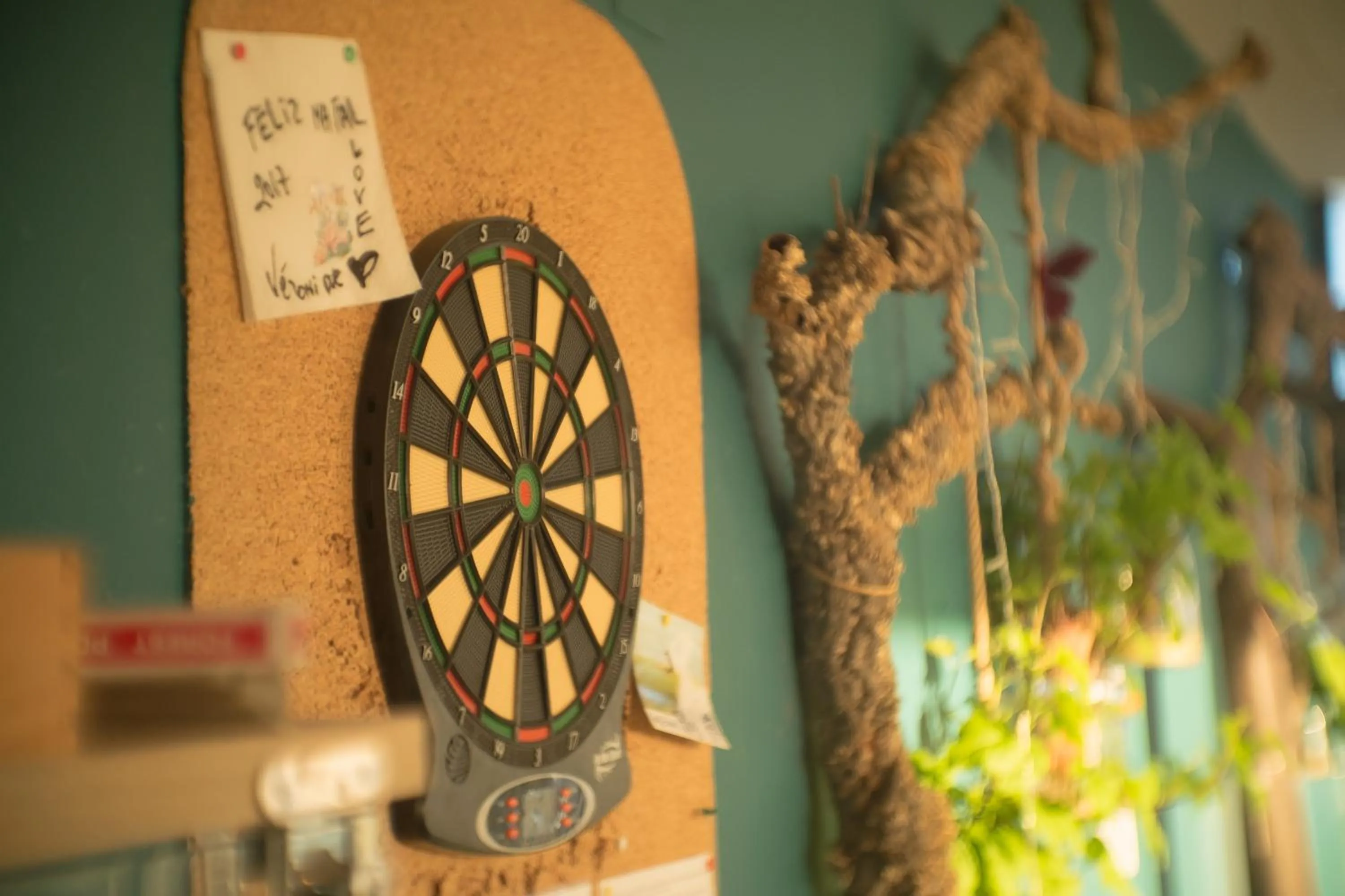 Communal lounge/ TV room in HI Arrifana Destination Hostel