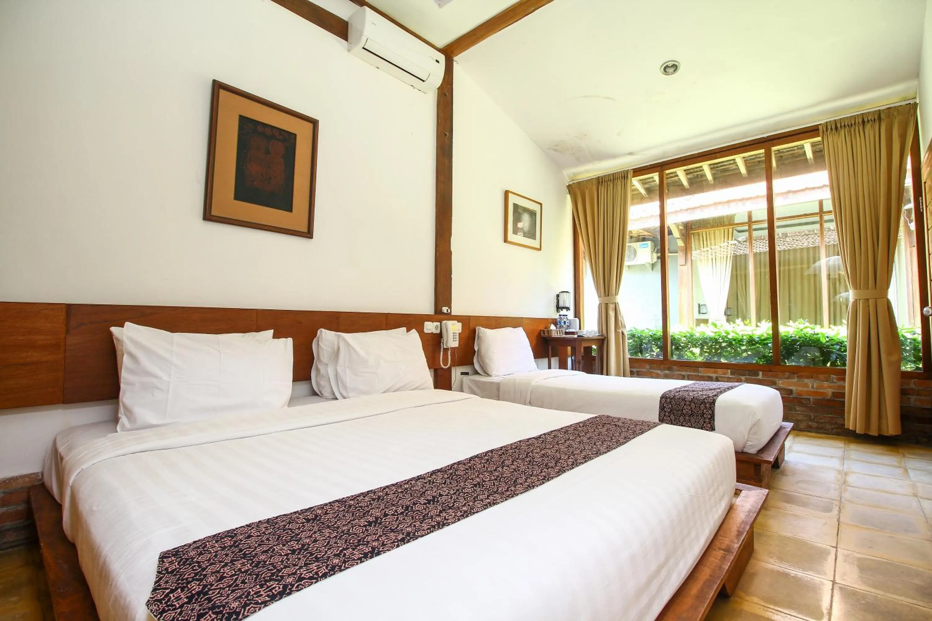 Bed in Cempaka Villa