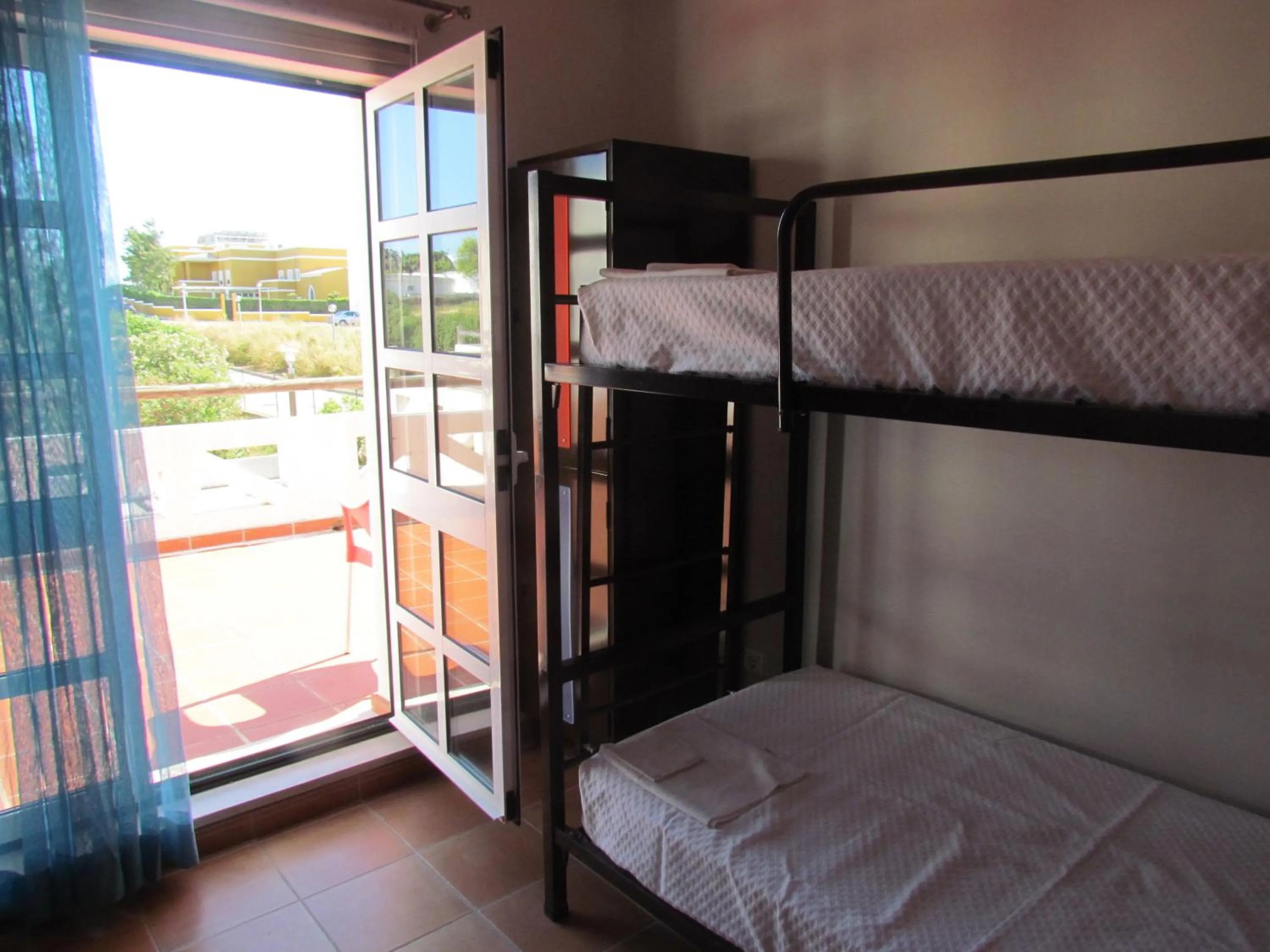 Bedroom, Bed in HI Portimão - Pousada de Juventude